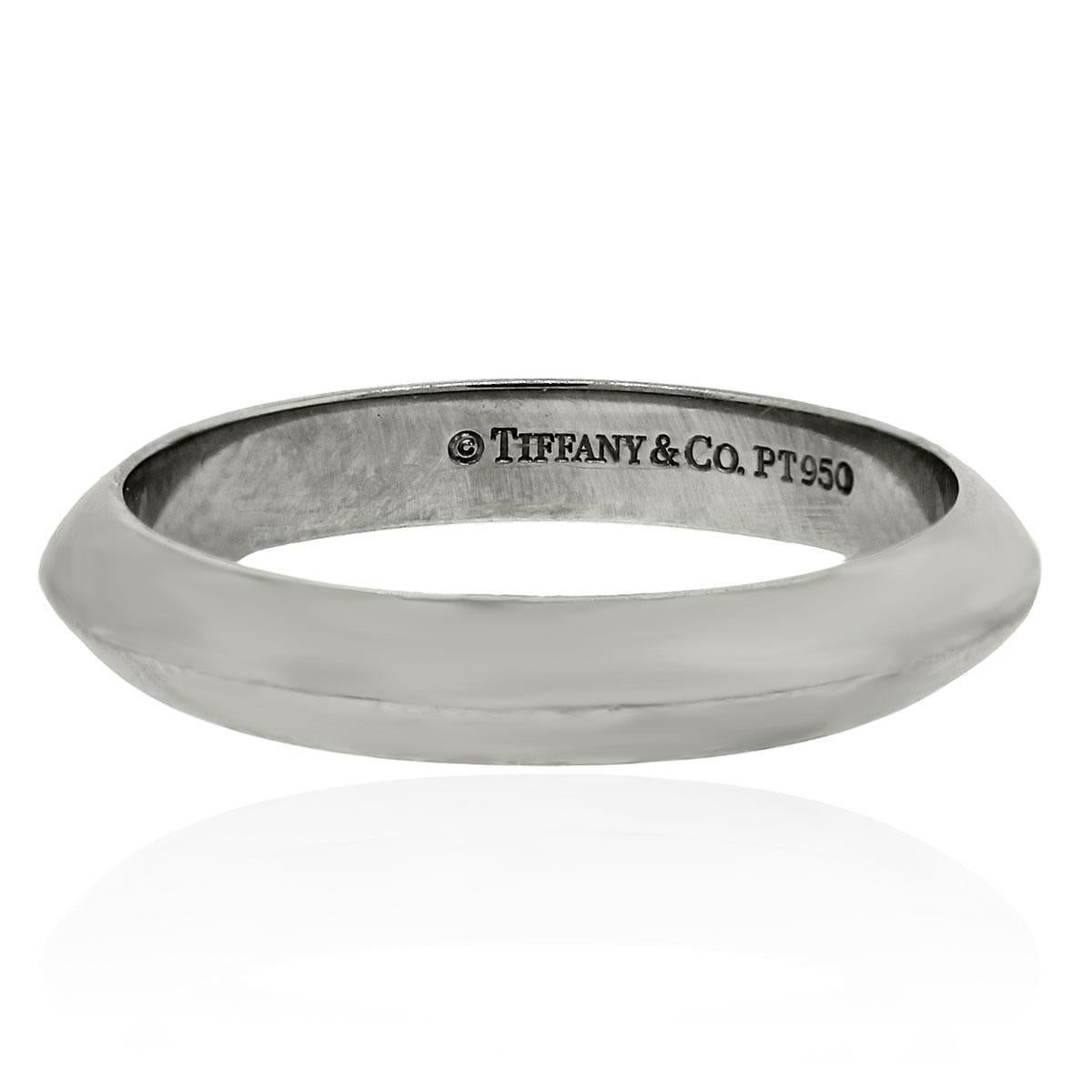 Tiffany & Co. 3mm Knife-Edge Platinum Wedding Band In Stock

Tiffany & Co. is known for making classic and timeless pieces, including this wedding band. This Tiffany & Co. ring is made in platinum and has a 3mm width. Platinum is a reliable and
