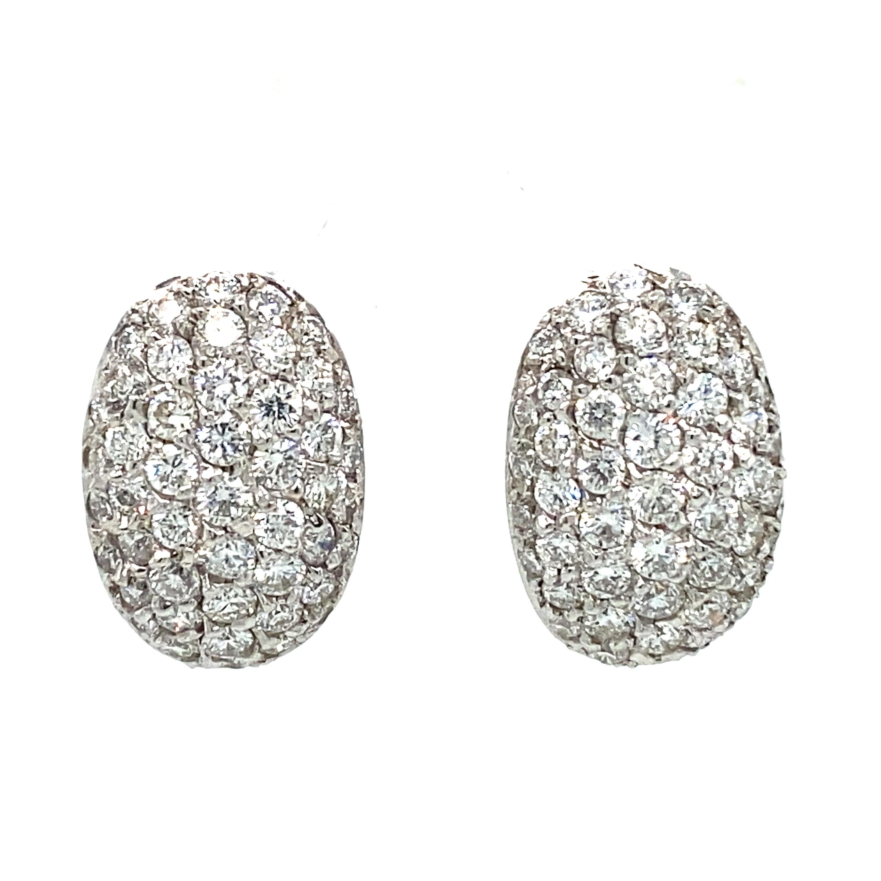 Item Details: This pair of earrings by Tiffany & Co. have pave diamonds totaling 4 carats. They are beautifully crafted with a detailed open back and omega clips. 

Circa: 1990s
Metal Type: 18 Karat White Gold
Weight: 8.0 grams
Size: 0.75 inch