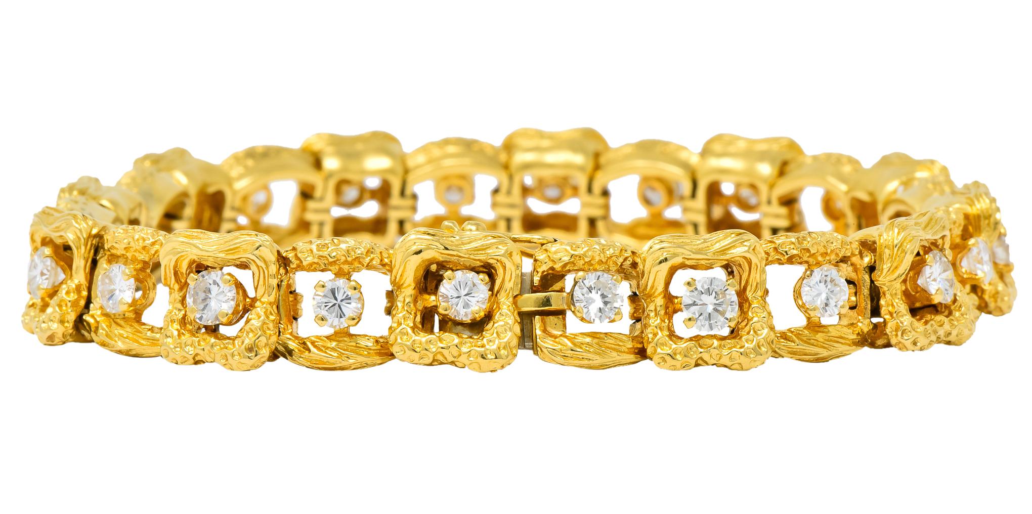 Featuring round brilliant cut diamonds weighing approximately 4.08 carat total, G/H color and VS clarity

Prong set amid squared textured and dimpled gold links of alternating depths

Detailed décor along sides of links

Slide together clasp with