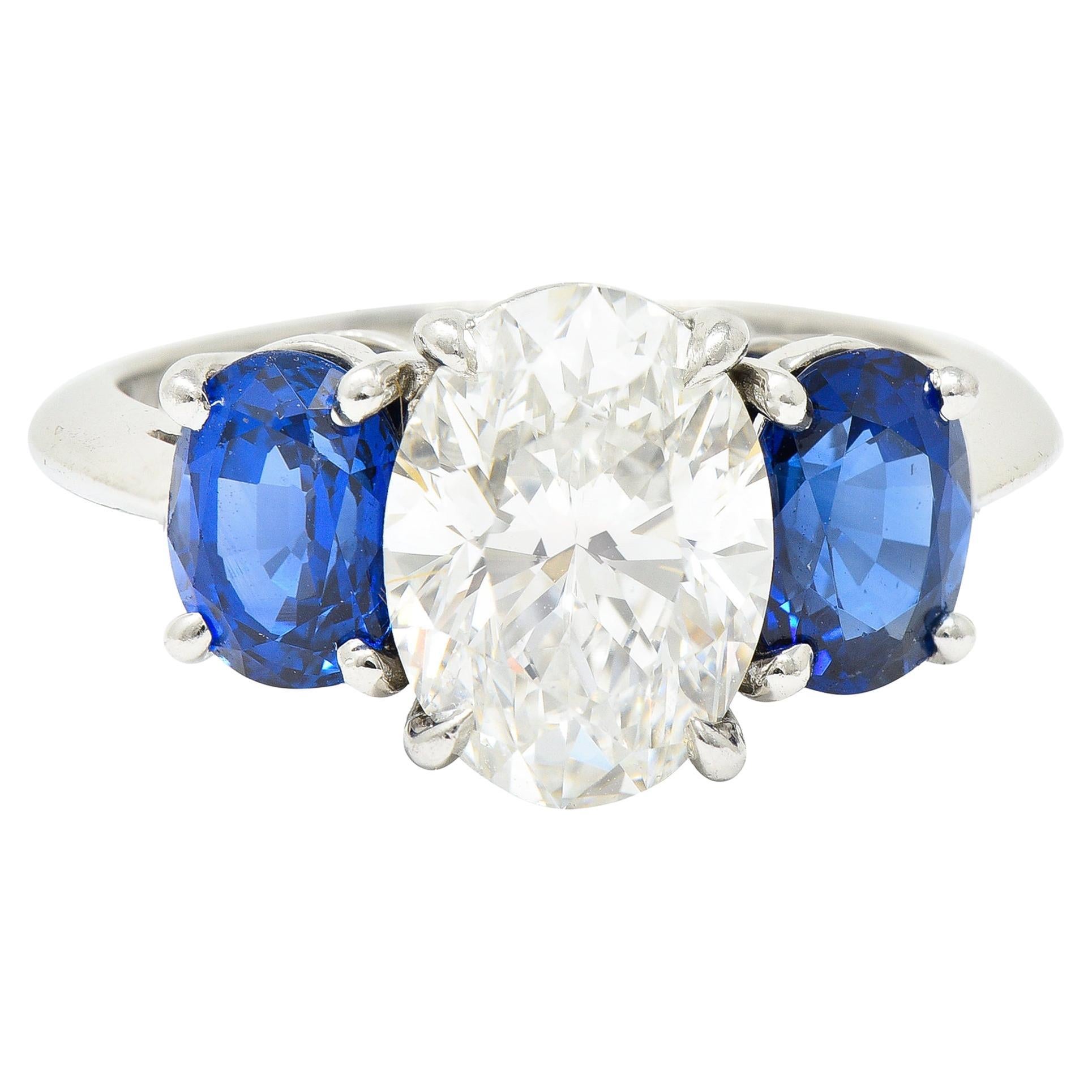Tiffany & Co. 4.26 Carats Oval Cut Diamond Sapphire Platinum Three Stone Ring