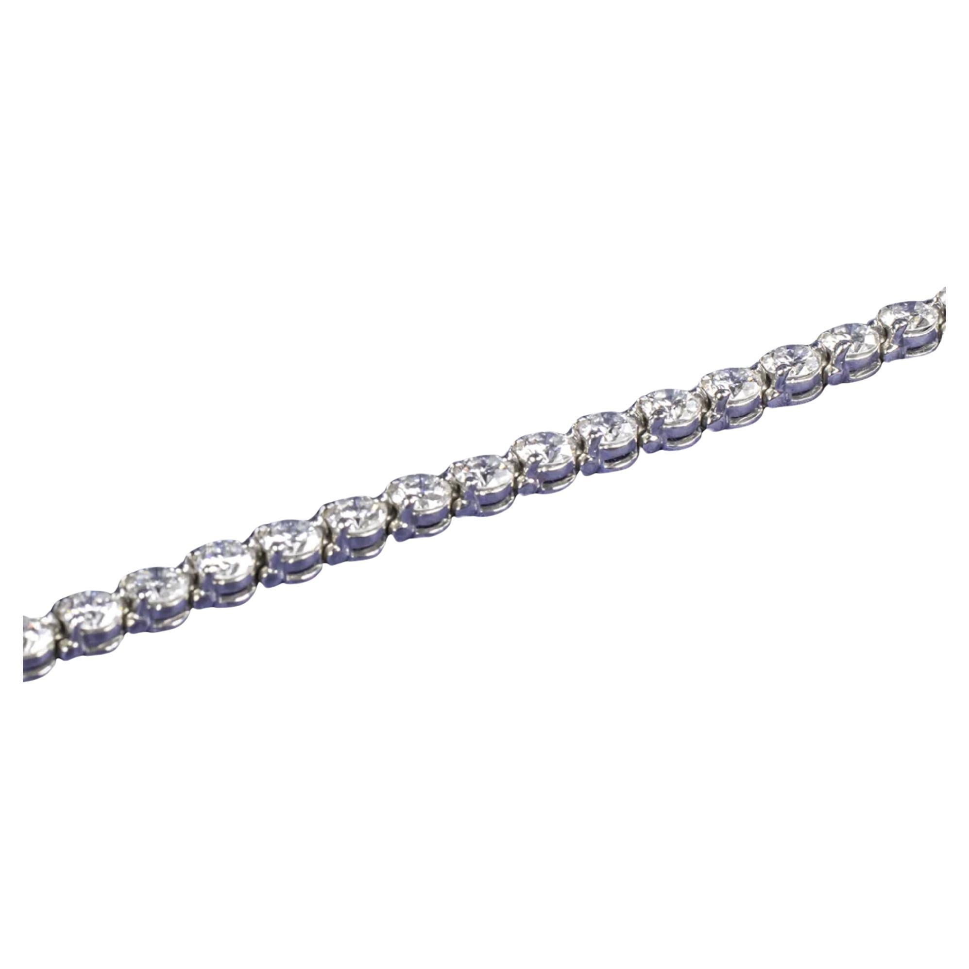 This authentic Tiffany diamond bracelet is substantial and absolutely fantastic quality! A diamond tennis bracelet is a time tested look that will always be in style! 
Highlights:
- 4.49 carats of diamonds for fantastic, substantial sparkle!
- The