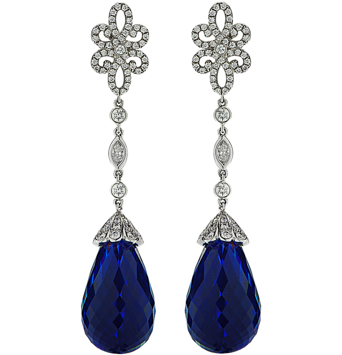Sensational Tiffany & Co. drop earrings crafted in platinum, showcasing two tanzanite briolette drops weighing 46.84 carats total, round brilliant cut diamonds weighing approximately .99 carats total E-F color, VVS-VS clarity and marquise brilliant
