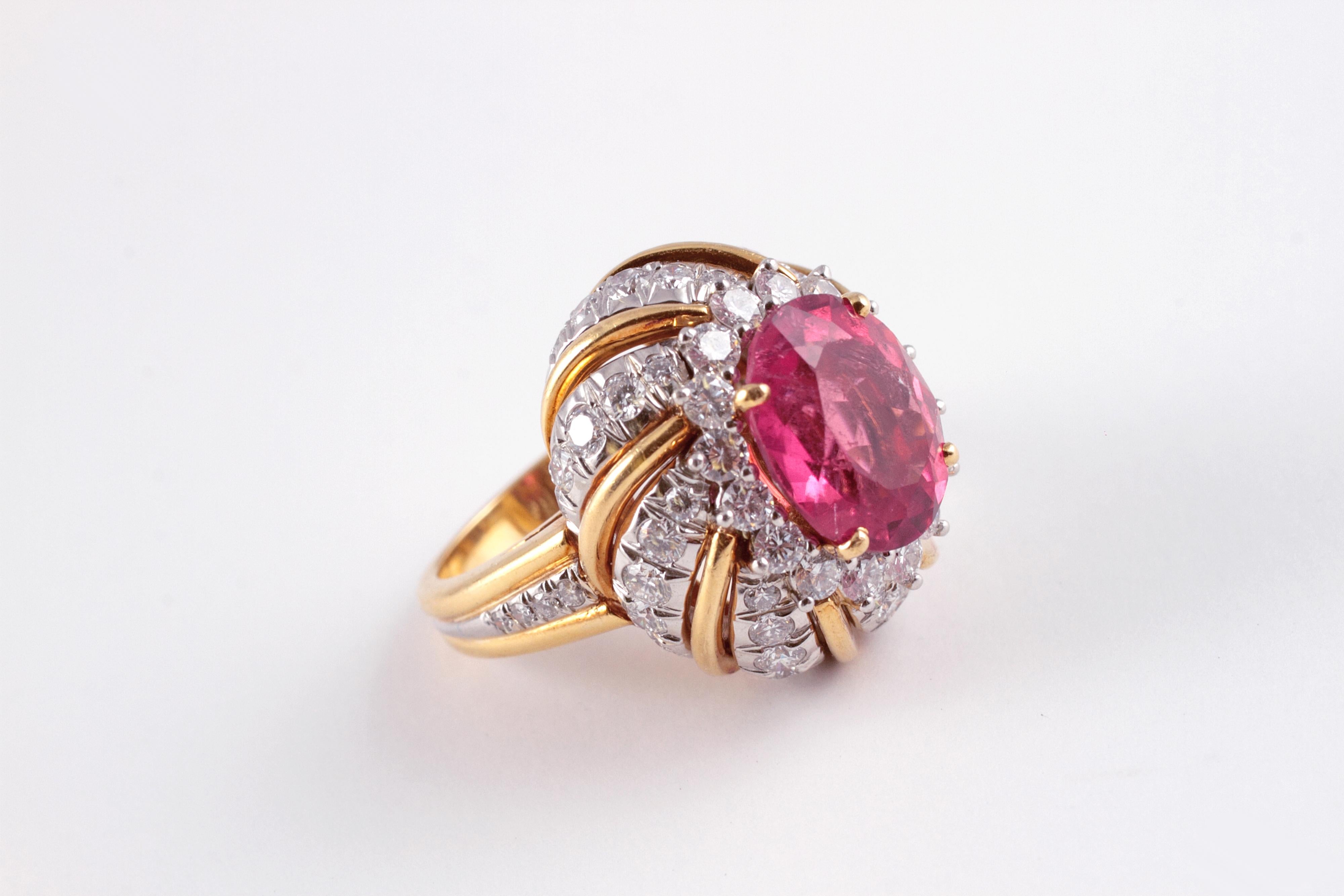 A Tiffany Stunner!  This ring features a lovely 4.95 carat rubellite and 2.05 carats of diamonds that are stated to be VS 1 - VS 2 in clarity and G - H in color.  Size 5 1/2. 