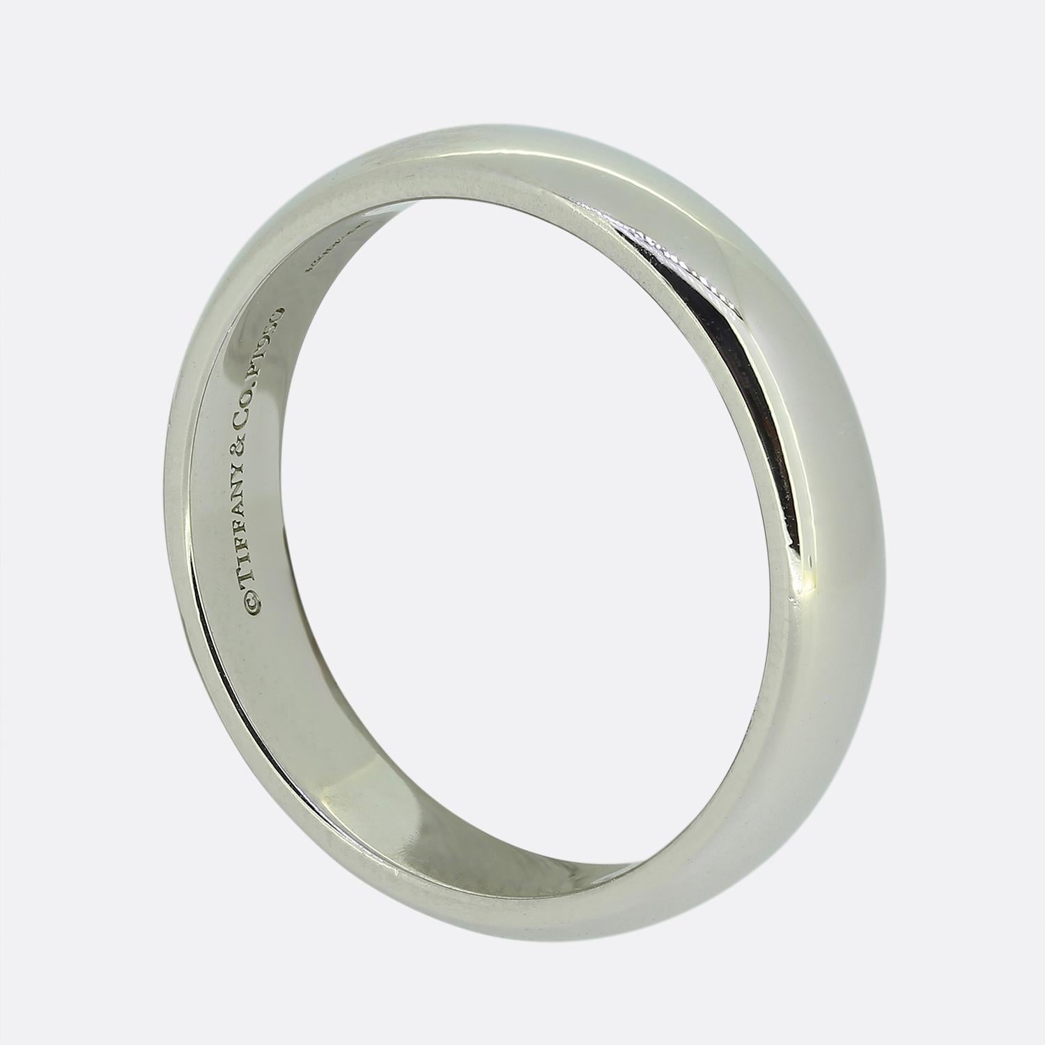 Here we have a classic plain polished wedding band ring from the world renowned jewellery designer, Tiffany & Co. This timeless piece has been crafted from platinum and is 4mm in width making it perfect for both men and women.

Condition: Used