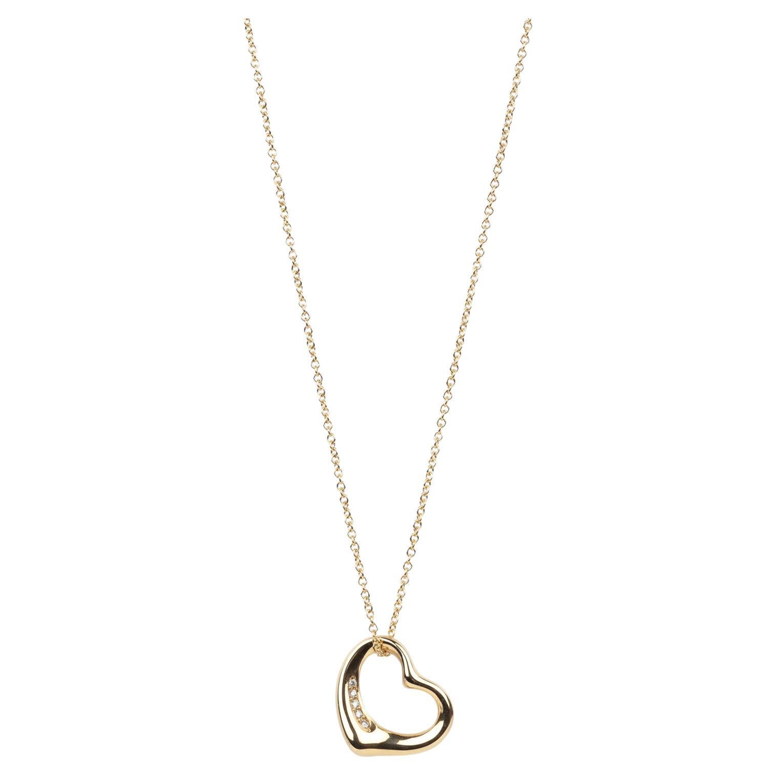 Tiffany
Co. 5 diamants or jaune 18ct 16mm Elsa Peretti Open Heart Pendentif