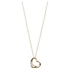 Tiffany
Co. 5 diamants or jaune 18ct 16mm Elsa Peretti Open Heart Pendentif