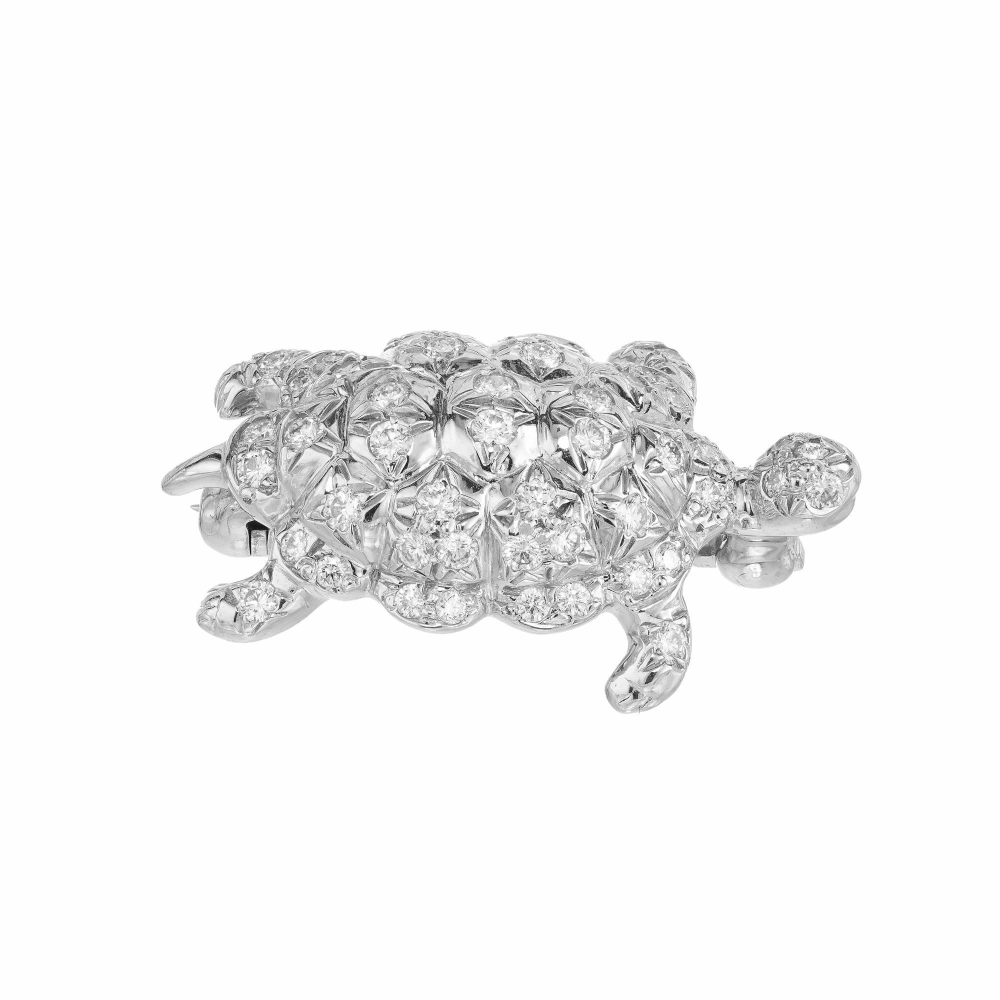 An exquisite .50 carat Tiffany & Co platinum diamond turtle brooch that can be used as a pendant as well. It’s an extremely well-crafted modern piece with 53 round brilliant diamonds throughout that are extremely high quality which Tiffany is known