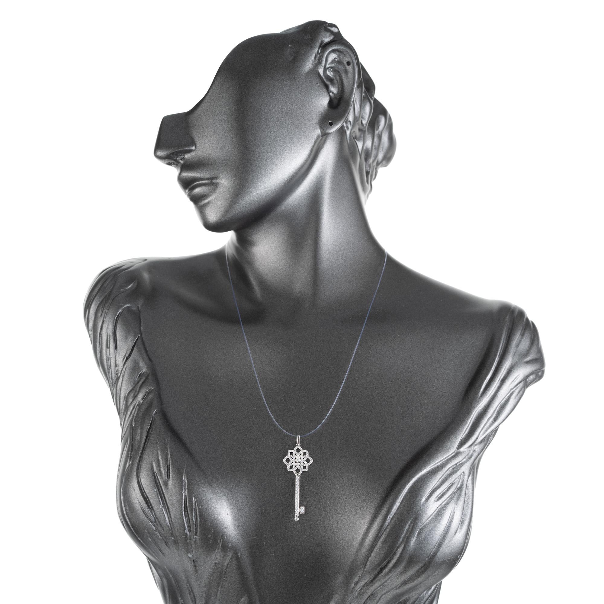 Women's Tiffany & Co .50 Carat Round Diamond Platinum Key Pendant For Sale