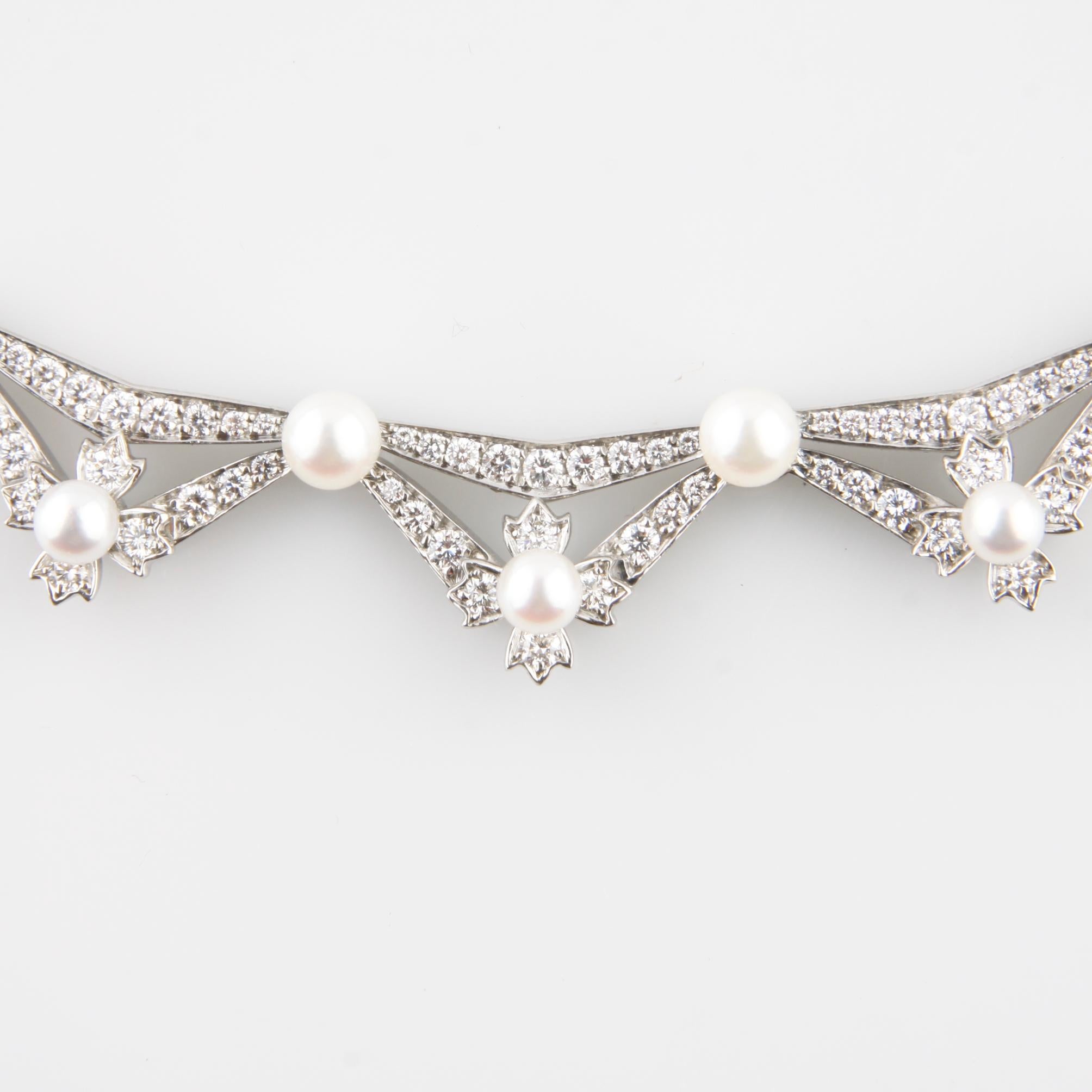 Gorgeous Tiffany & Co. Victorian Inspired Diamond and Pearl Necklace set in Platinum
Total Diamond Carat Weight: Approx 5.00 carats
Average Diamond Color: D (Colorless)
Average Diamond Clarity: VS
Pearls range from 3mm to 4.5mm
Fits up to a 14.5