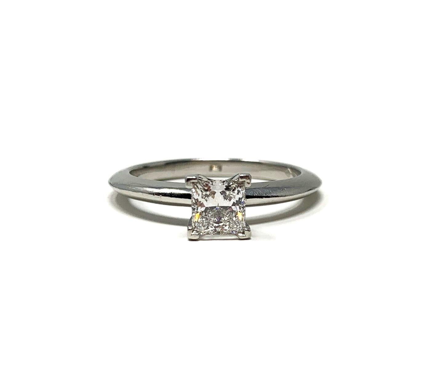 Tiffany & Co. .55ct Square Solitaire Diamond Engagement Ring G VS2 Size 5.75

Condition:  Excellent (Professionally Cleaned and Polished)
Metal:  Platinum 950 (Marked, and Professionally Tested)
Weight:  4.5g
Size:  5.75
Band Width:  2mm 
Ring