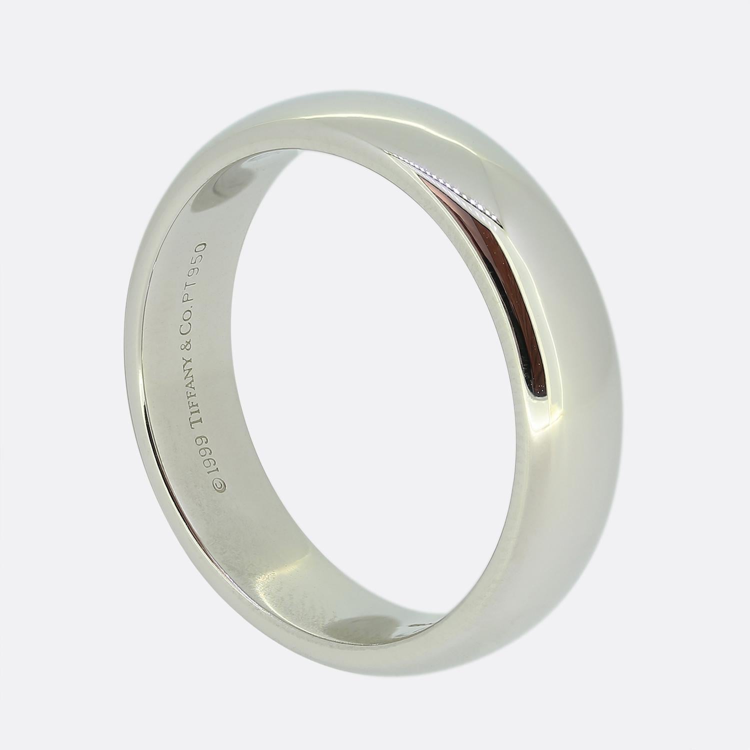 Here we have a classic plain polished wedding band ring from the world renowned jewellery designer, Tiffany & Co. This timeless piece has been crafted from platinum and is 5.5mm in width making it perfect for both men and women.

Condition: Used