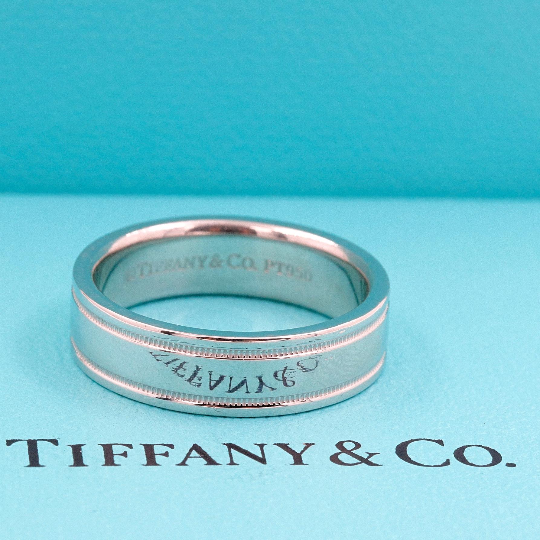 TIFFANY & CO Essential Wedding Band Ring

Style:  Double Milgrain
Metal:  Platinum PT950
Size:  8.25 - sizable
Width:  6 MM
Hallmark:  ©TIFFANY&CO.PT950
Includes:  T&C Ring Pouch

Retail Value:  $2,325

SKU#1300TGC050819-8.25SZ-KK
