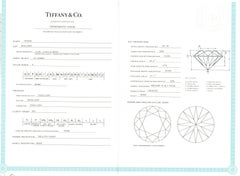 Tiffany & Co. .61 Carat Diamond Knife Edge Engagement Ring and Wedding Band