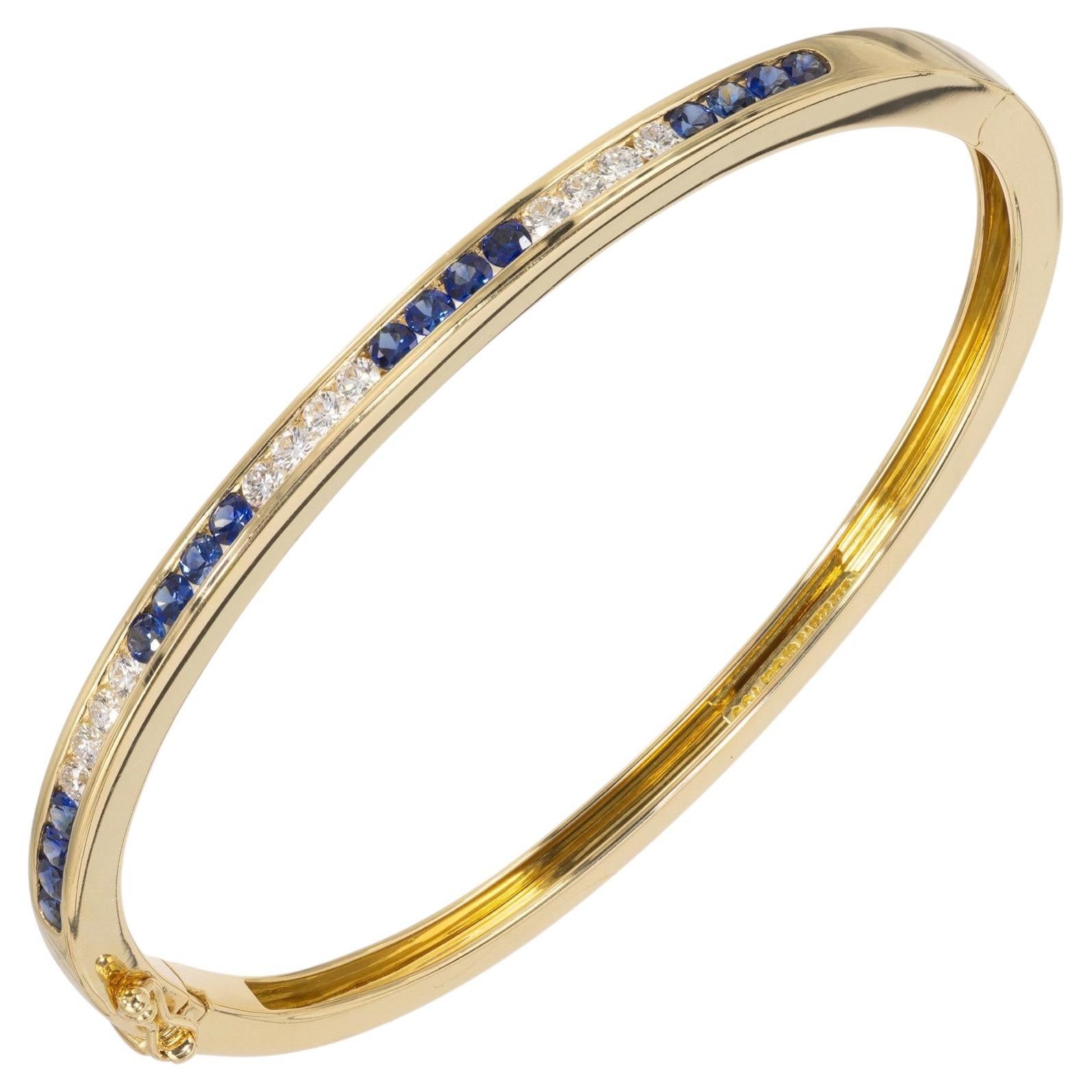 Tiffany & Co. .64 Carat Round Sapphire Diamond 18k Yellow Gold Bangle Bracelet