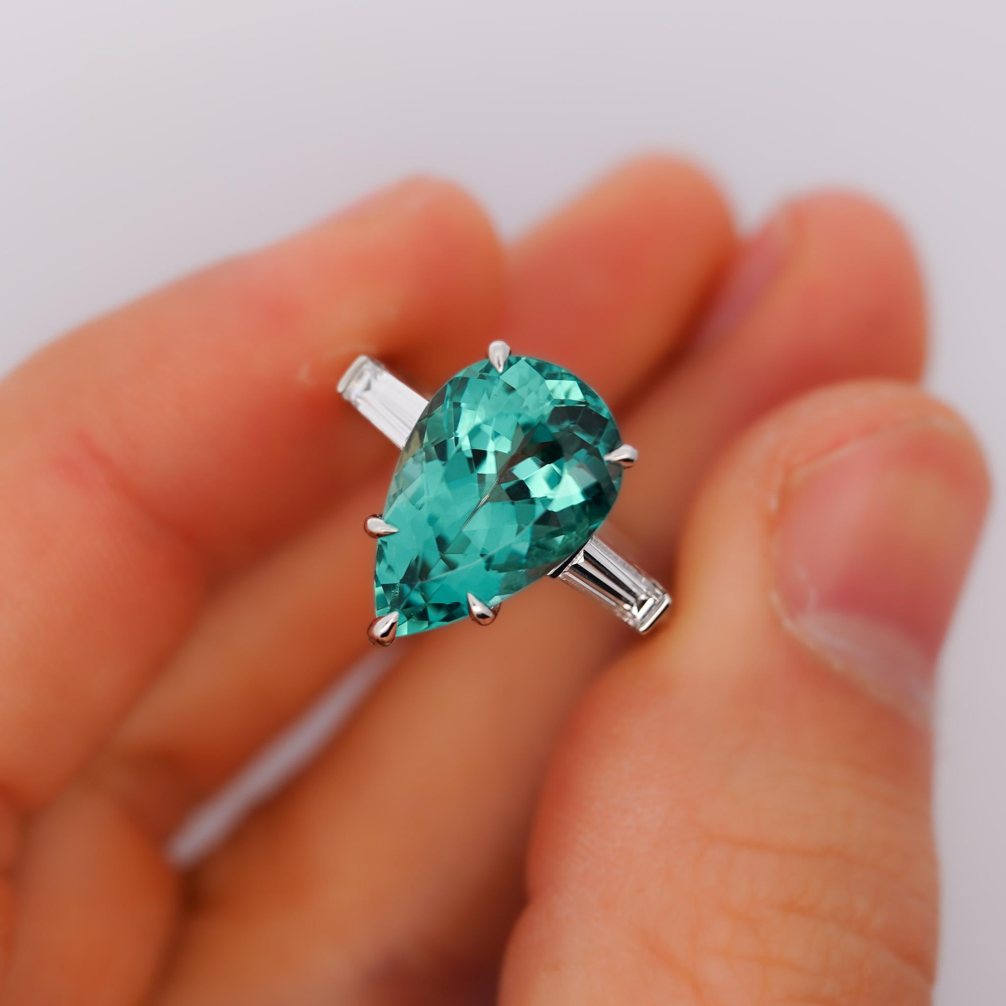 Vintage Tiffany & Co. Signed 6.5 Carat Pear Cut Green-Blue Tourmaline and Baguette Cut Diamond Three Stone Platinum Engagement Ring. Ring size 7.5, GIA certified. Complete with the original Tiffany & Co. box.

Details:
Item Type: Three Stone