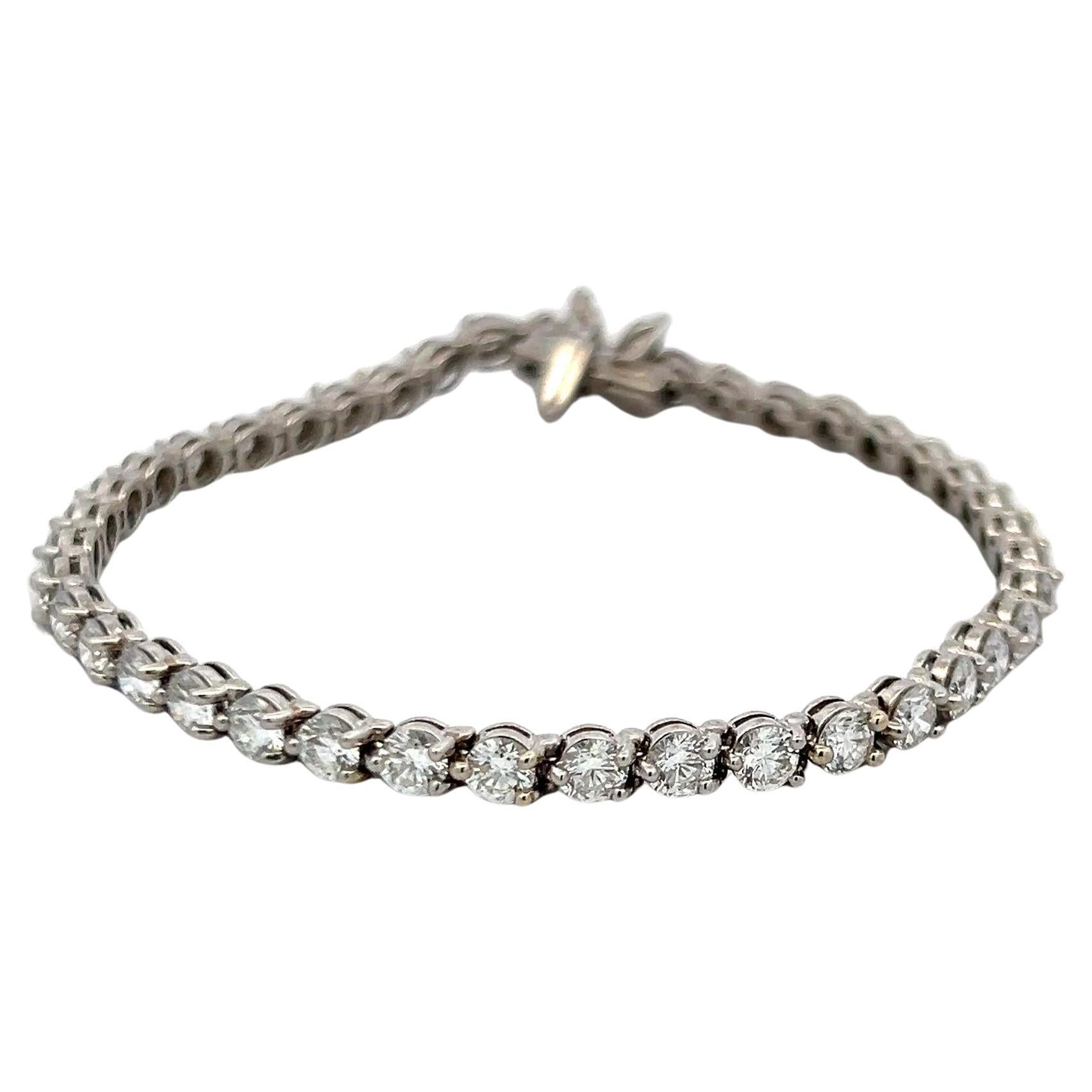 Tiffany
Co 6.59 Carat Round and Marquis Shape Diamond Platinum Tennis Bracelet