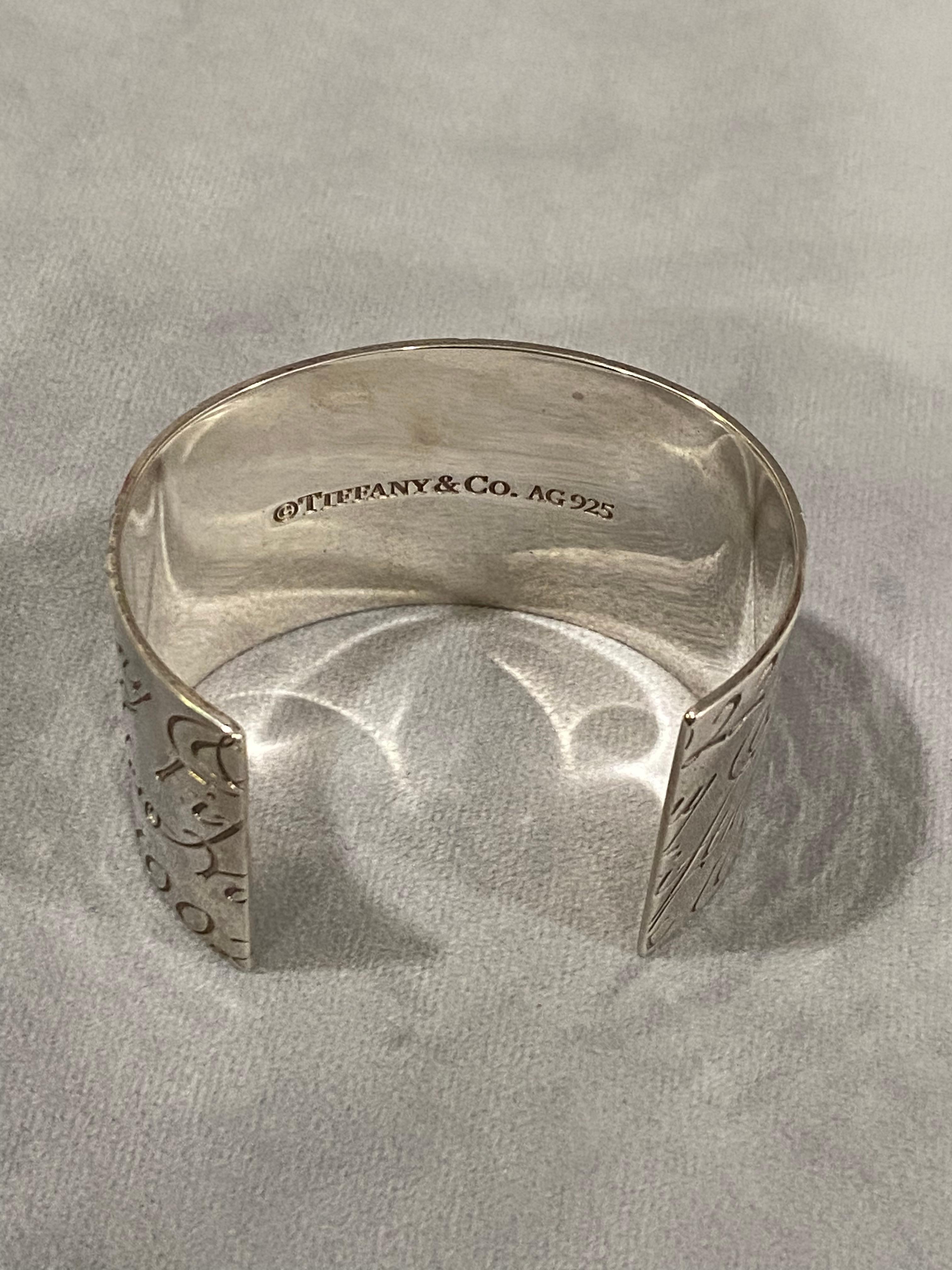 Tiffany & Co. 727 5th Avenue, Notes Collection, Sterling Wide Cuff Bracelet In Excellent Condition For Sale In New York, NY