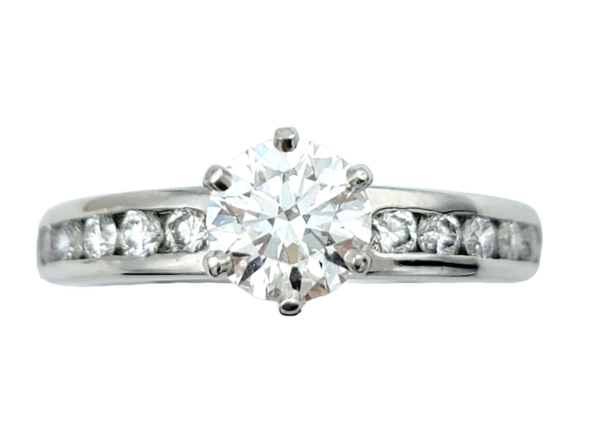 Ring size: 5.75

Say yes to this incredible diamond solitaire engagement ring from Tiffany & Co.! This classic Tiffany engagement ring gets a little modernized update with the addition of glittering diamonds along the shank, adding even more sparkle