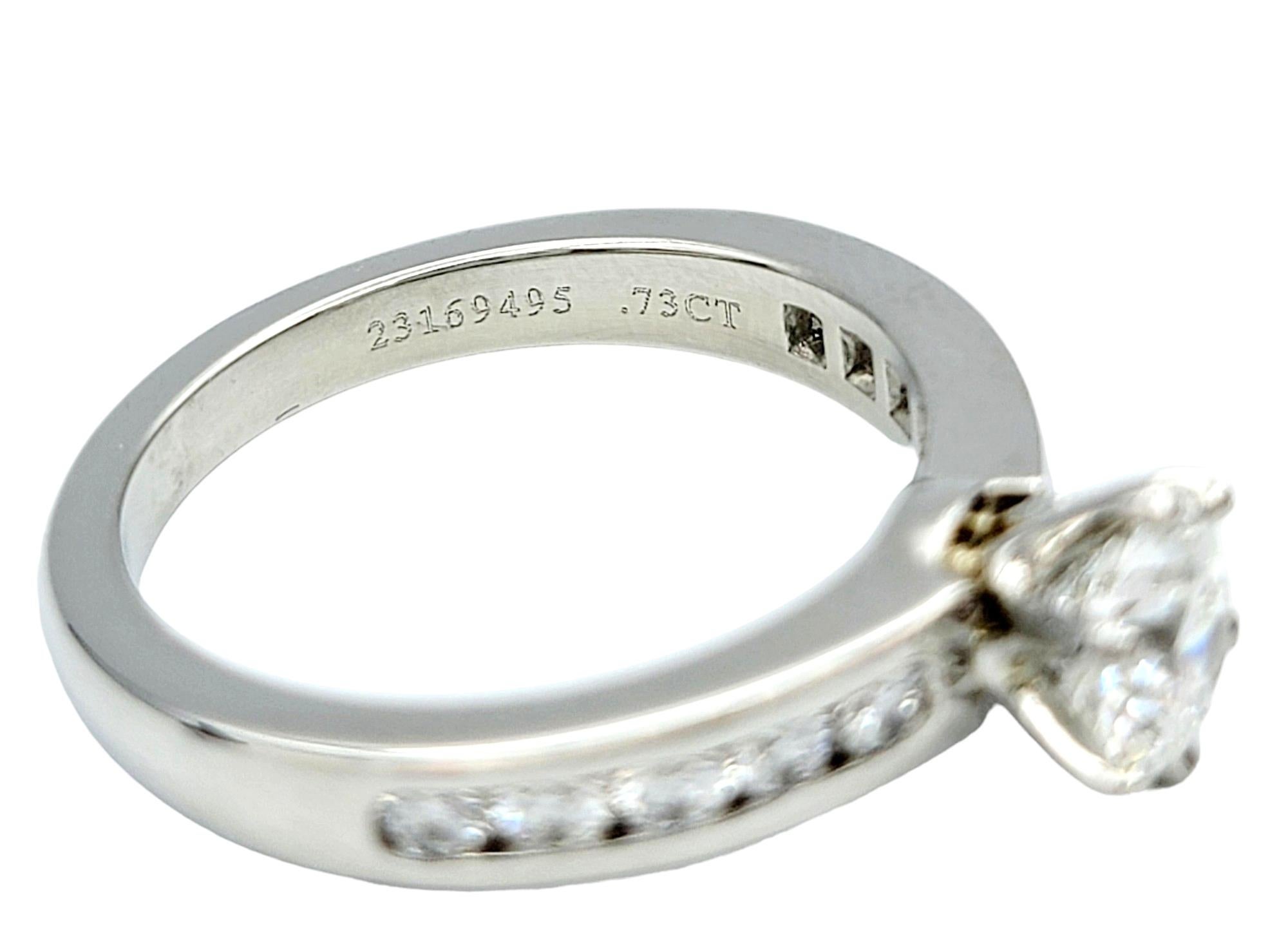 Tiffany & Co. .73 Carat Round Diamond Platinum Engagement Ring 10 Diamond Band  For Sale 1