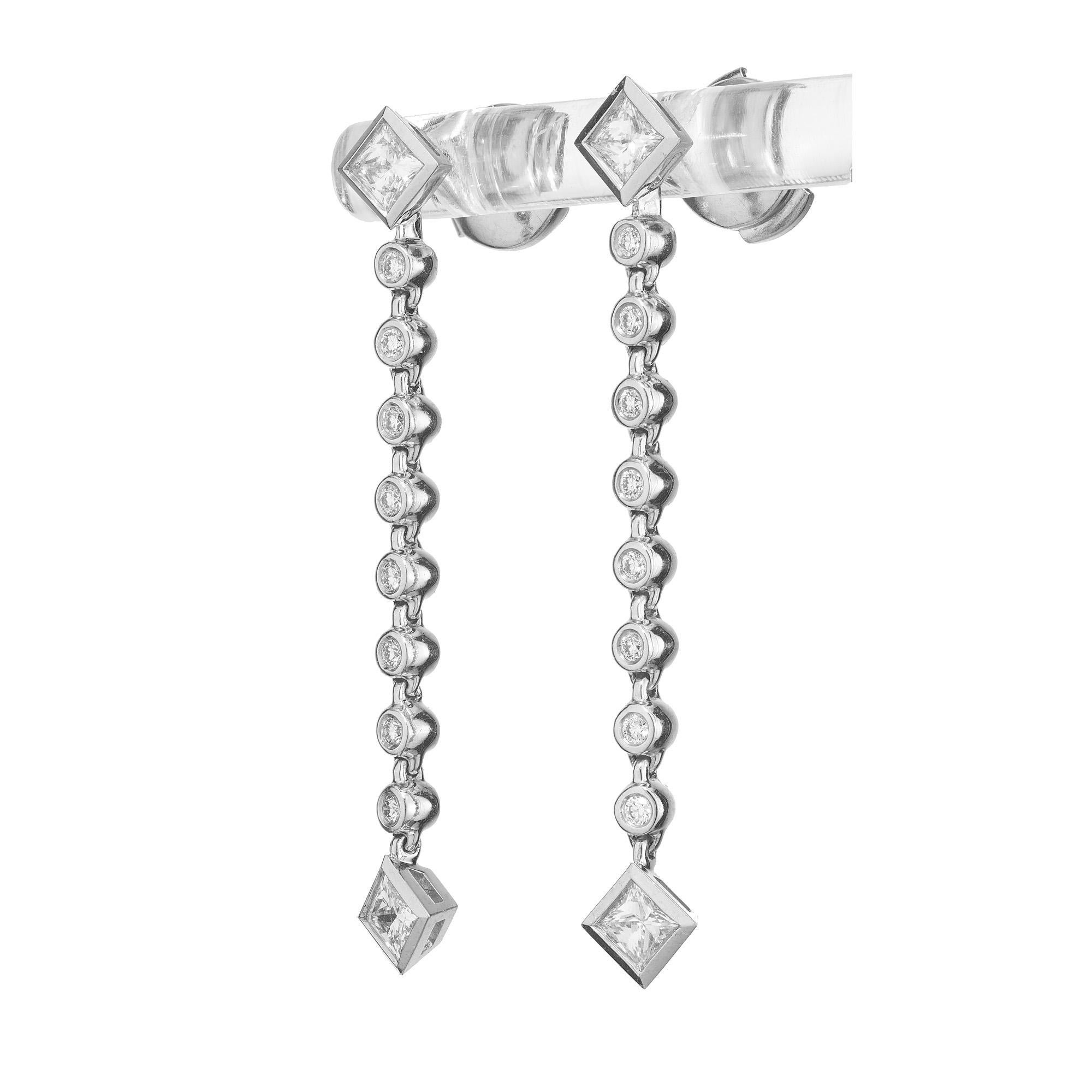 Orecchini a goccia con diamanti taglio Princess e tondo brillante della collezione 