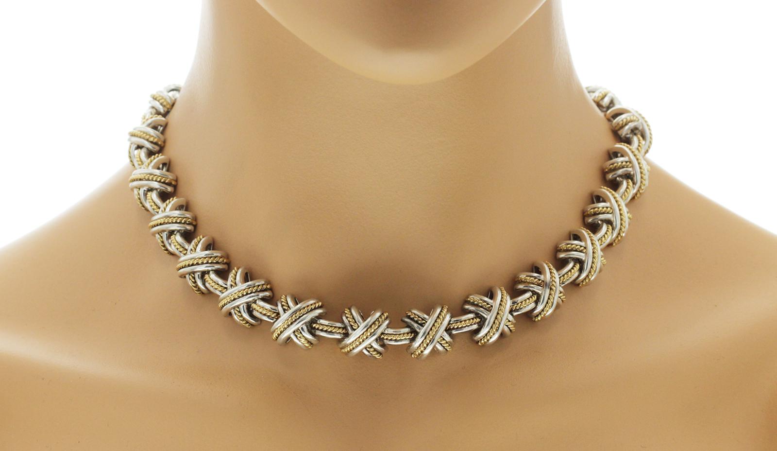 100% authentisch, 100% Kundenzufriedenheit 

Breite: 14 mm

Größe: 16 Zoll 

Metall: 925 Sterling Silber & 18K Gelbgold

Punzierungen: T&CO 925 750

Gesamtgewicht: 105,7 Gramm

Steinart: Keine

Zustand: PreOwned

Geschätzter Preis: