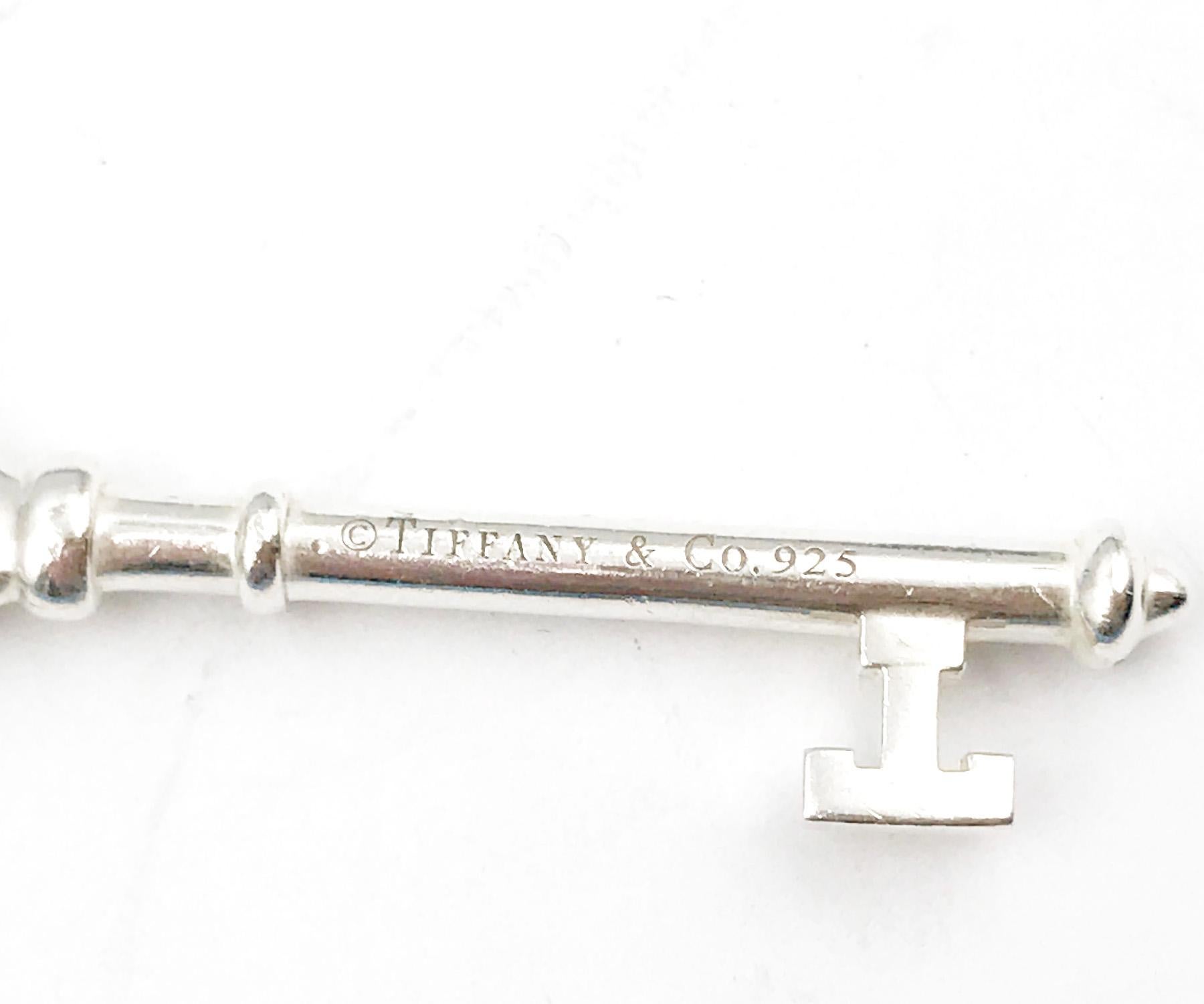Donna Ciondolo a forma di chiave a margherita grande in argento 925 e diamanti di Tiffany & Co. in vendita