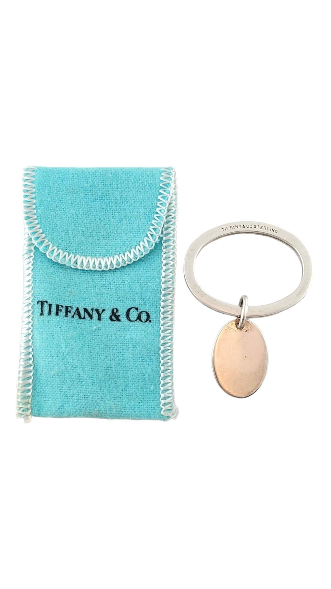 Tiffany & Co. 925 Sterling Silver Oval Key Ring with Tag

This beautiful oval key ring by Tiffany & Co. is crafted from 925 sterling silver with an adorable oval tag charm!

Ring size: 36.45mm X 28.4mm X 2.89mm
Charm size: 22.05mm X 15.57mm X