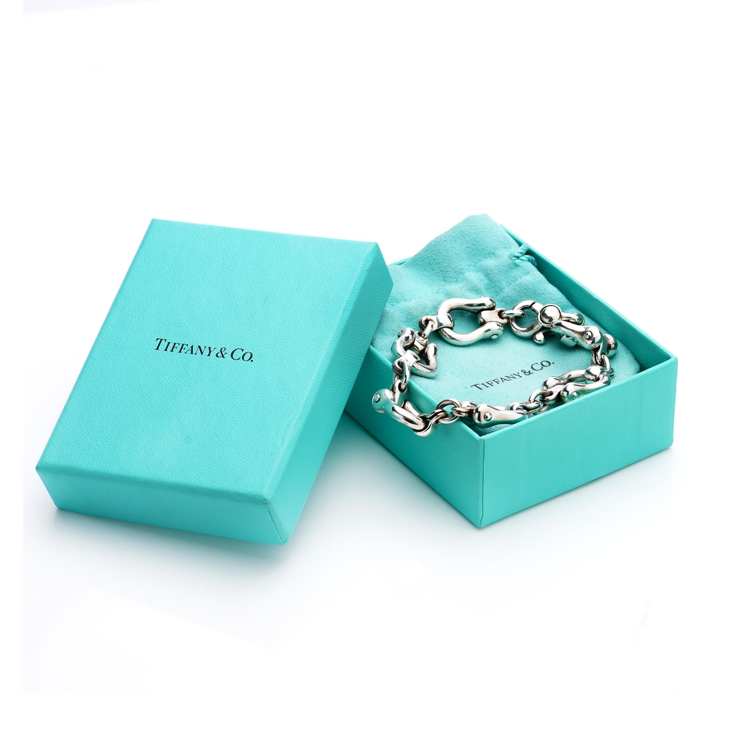 Tiffany & Co. 925 sterling silver rare horseshoe link bracelet. 
Made in Italy, Between 1995 to 1997, imported to England, in 2000 

This handmade  bracelet is from the 1995 -  1997 collection and has no longer been made, 
It is an example of fine
