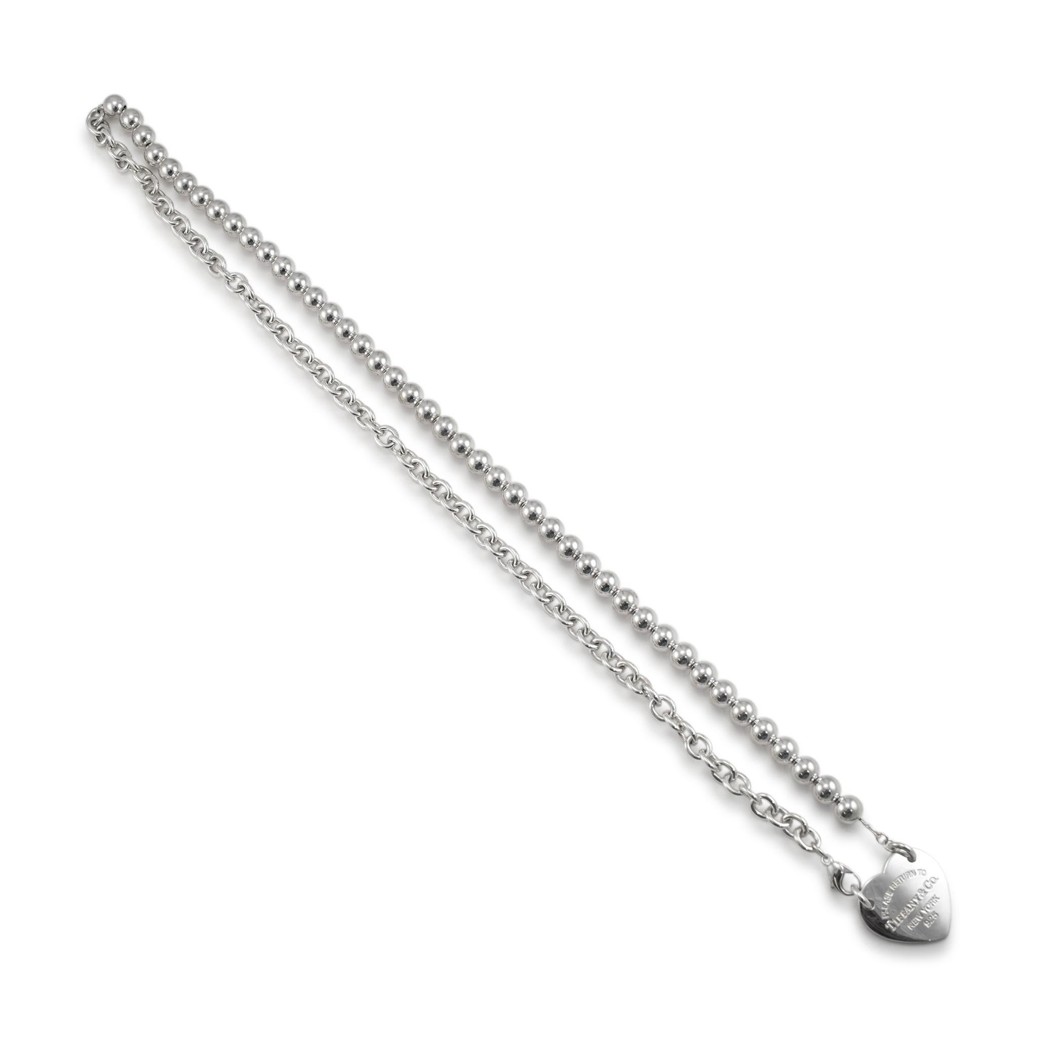 Marke: Tiffany & Co.

Geschlecht: Damen

Metall Typ: 925 Sterling Silber

Länge: 30.00 in

Breite: 9,05 mm Verjüngung auf 8,25 mm

Gewicht: 91,93 Gramm

Silberne Halskette für Damen. Das Metall wurde getestet und als 925 (STERLING) Silber bestimmt.