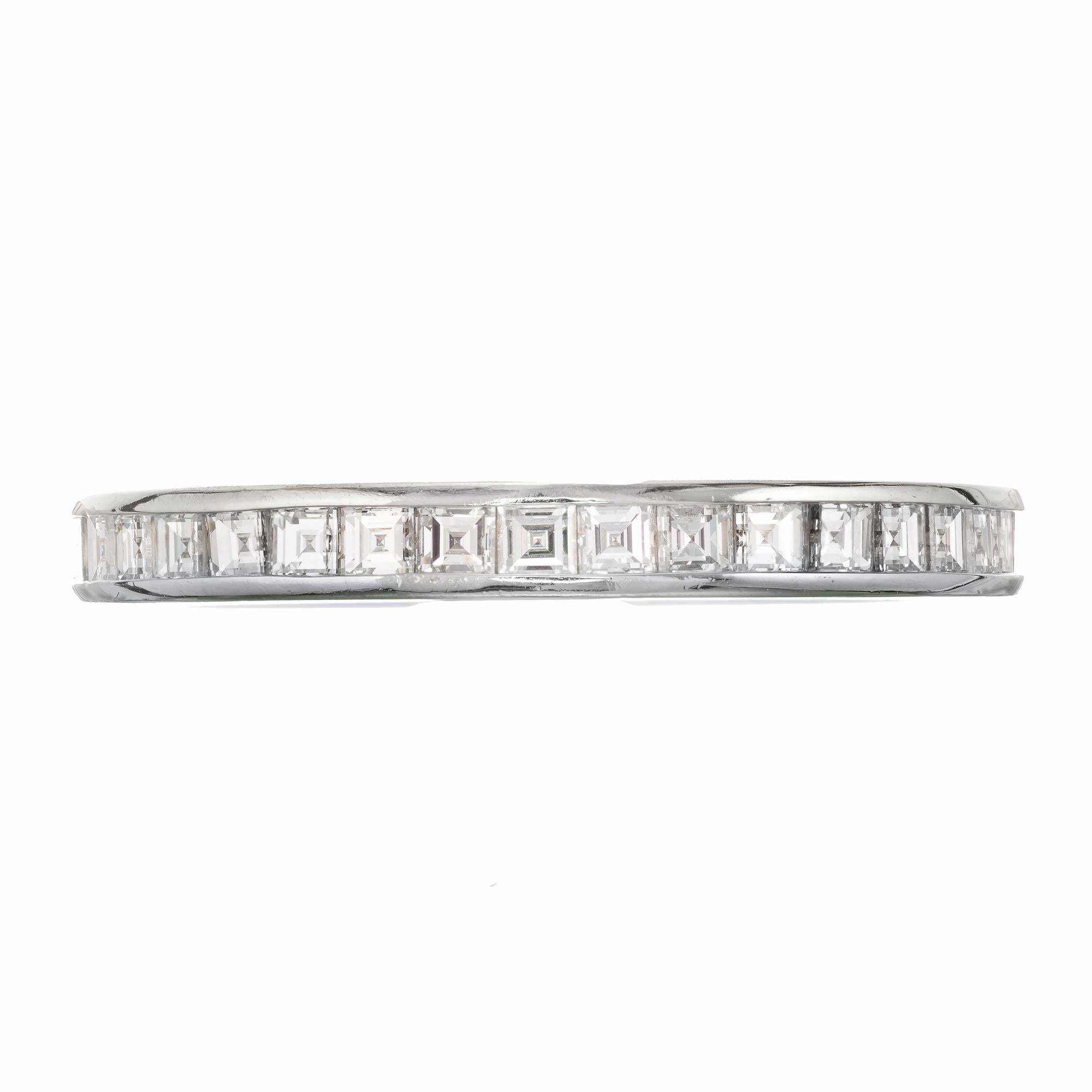 Tiffany & Co. Platinum Eternity ring with square diamonds. Tiffany stamp is a bit faint but correct

3.2 grams
36 square diamonds, approximate total weight .95cts F to G, VS
Size 6 and not sizable
Tested: Platinum
Stamped: Tiffany & Co. 95
Depth: