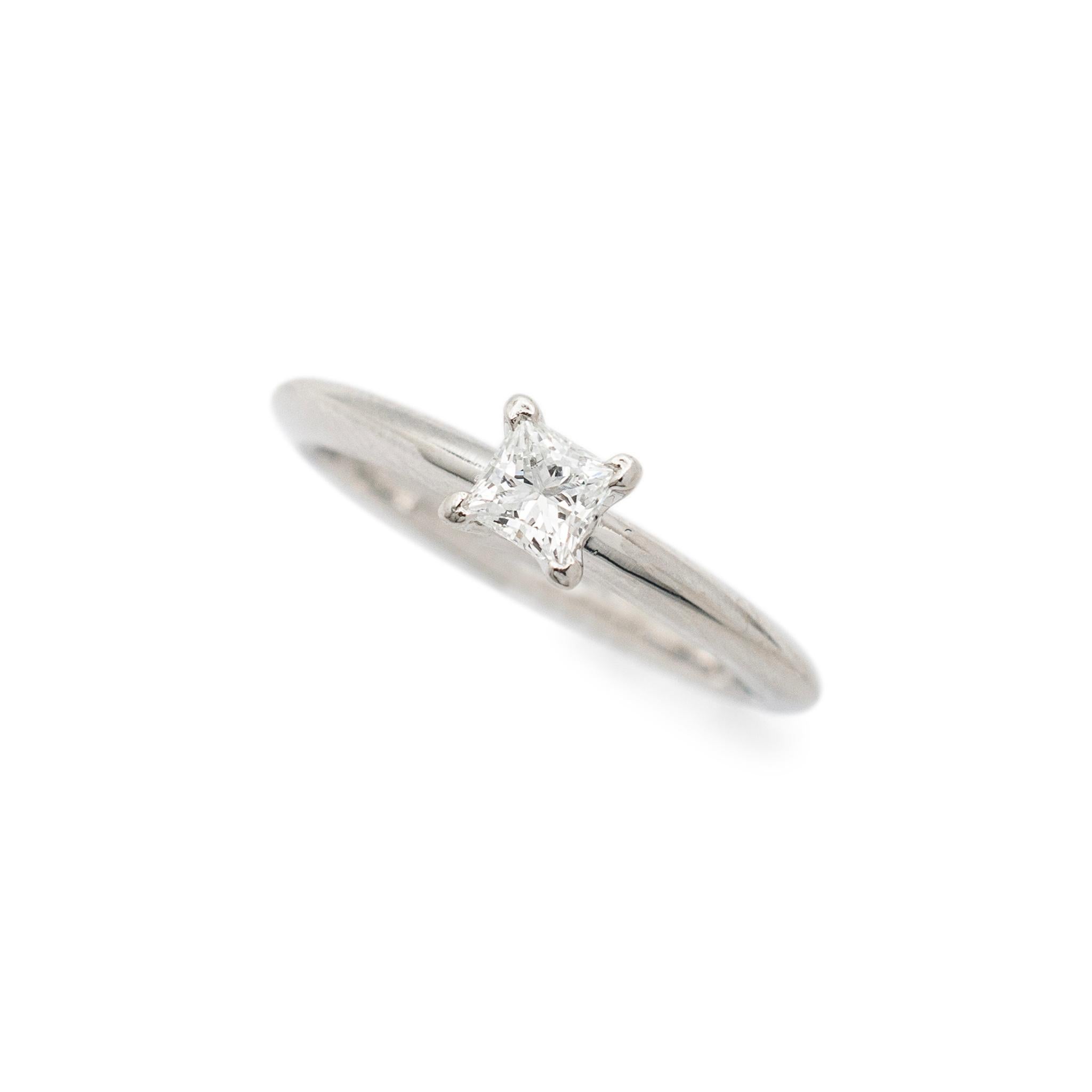 Gender: Ladies

Metal Type: 950 Platinum

Size: 4

Width: 2.00 mm

Weight: 3.63 grams

950 platinum diamond solitaire engagement ring with a half round shank. The metal was tested and determined to be 950 platinum. Engraved with 