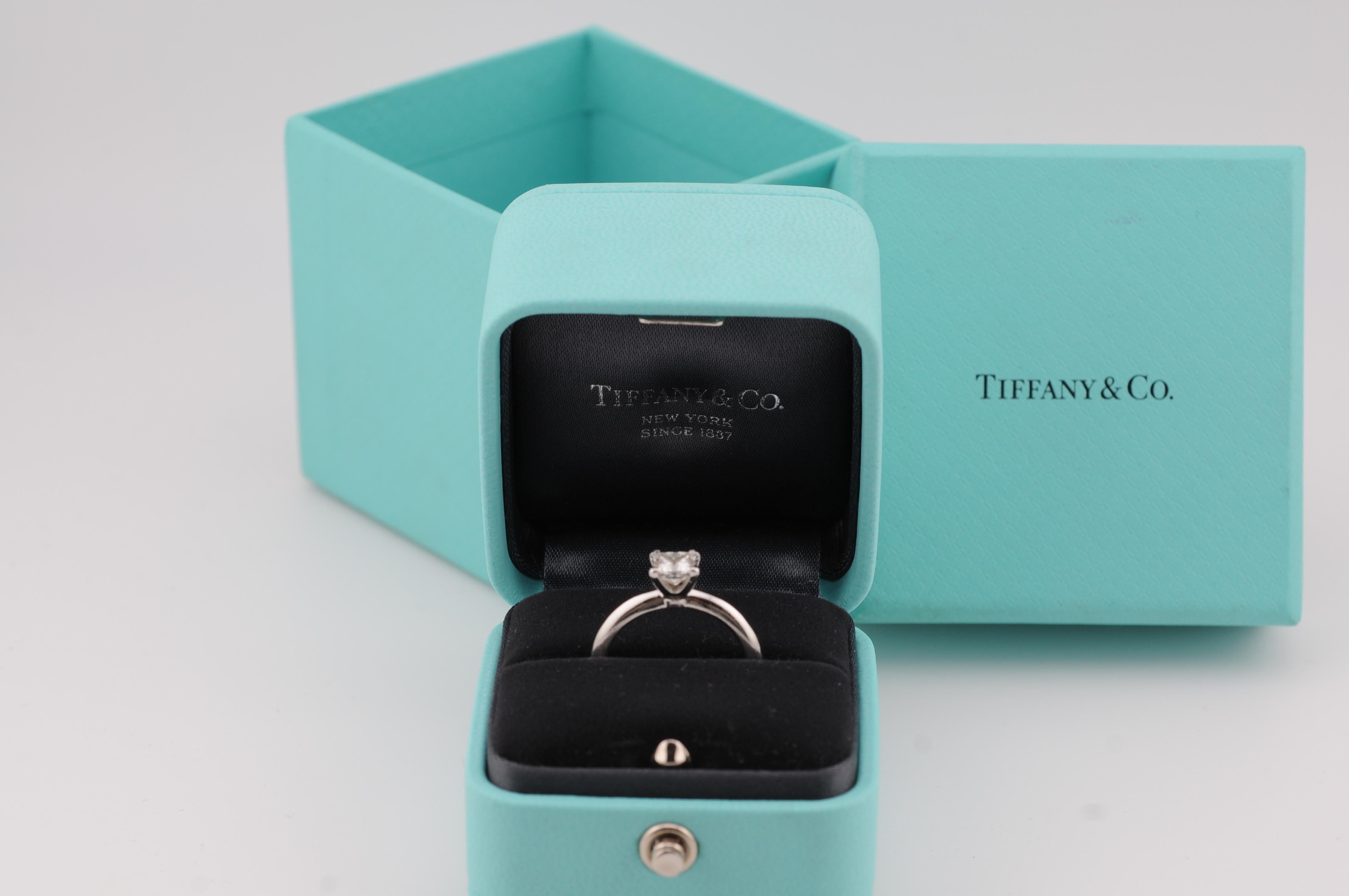 Tiffany & Co. 950 Platinum Engagement Ring with 0.70ct Princess-Cut Diamond

A timeless engagement ring from Tiffany & Co., crafted in premium 950 platinum, featuring a stunning princess-cut diamond of exceptional quality.

Diamond Details:

Carat: