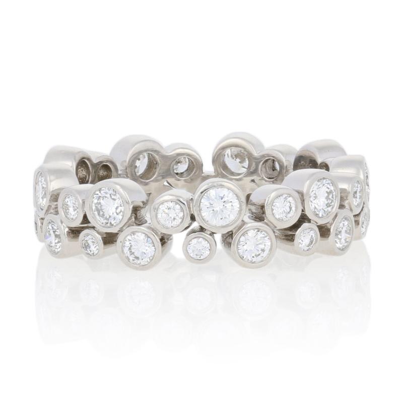Celebrate life’s joyous milestones with the gift of Tiffany & Co. jewelry! Crafted in heirloom-quality 950 platinum, this Bubbles Eternity band sparkles with a resplendent collection of white diamonds. This designer ring originally retails for