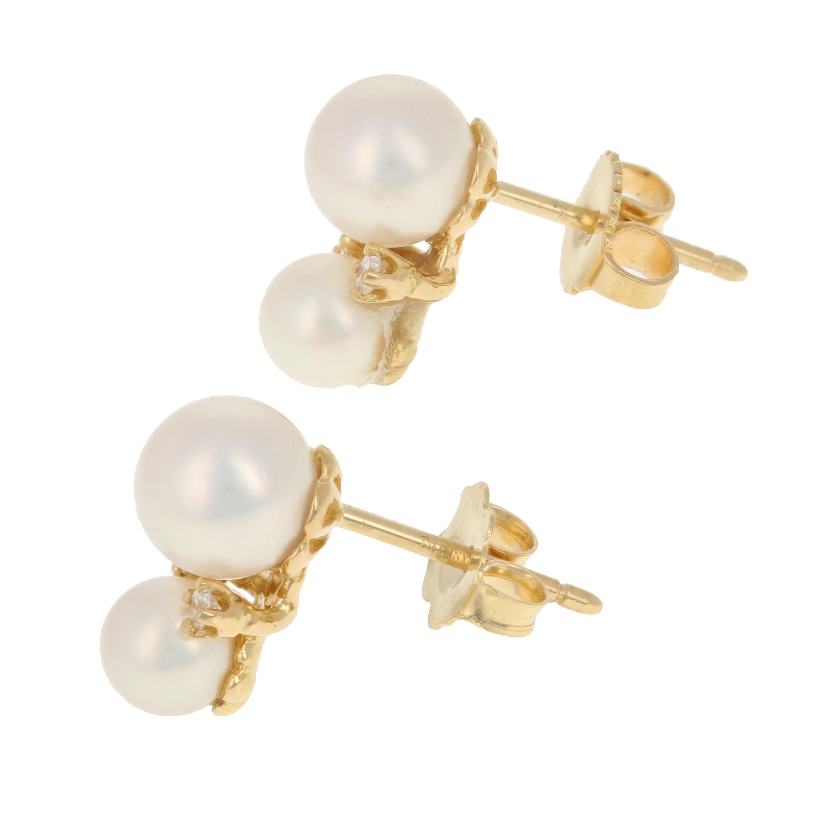 Brand: Tiffany & Co.
Please note, one butterfly back is generic and is not original to the set.

Metal Content: Guaranteed 18k Gold as stamped

Stone Information: 
Akoya Pearls 

Natural Diamonds  
Clarity: VS1
Color: G
Cut: Round Brilliant
Total