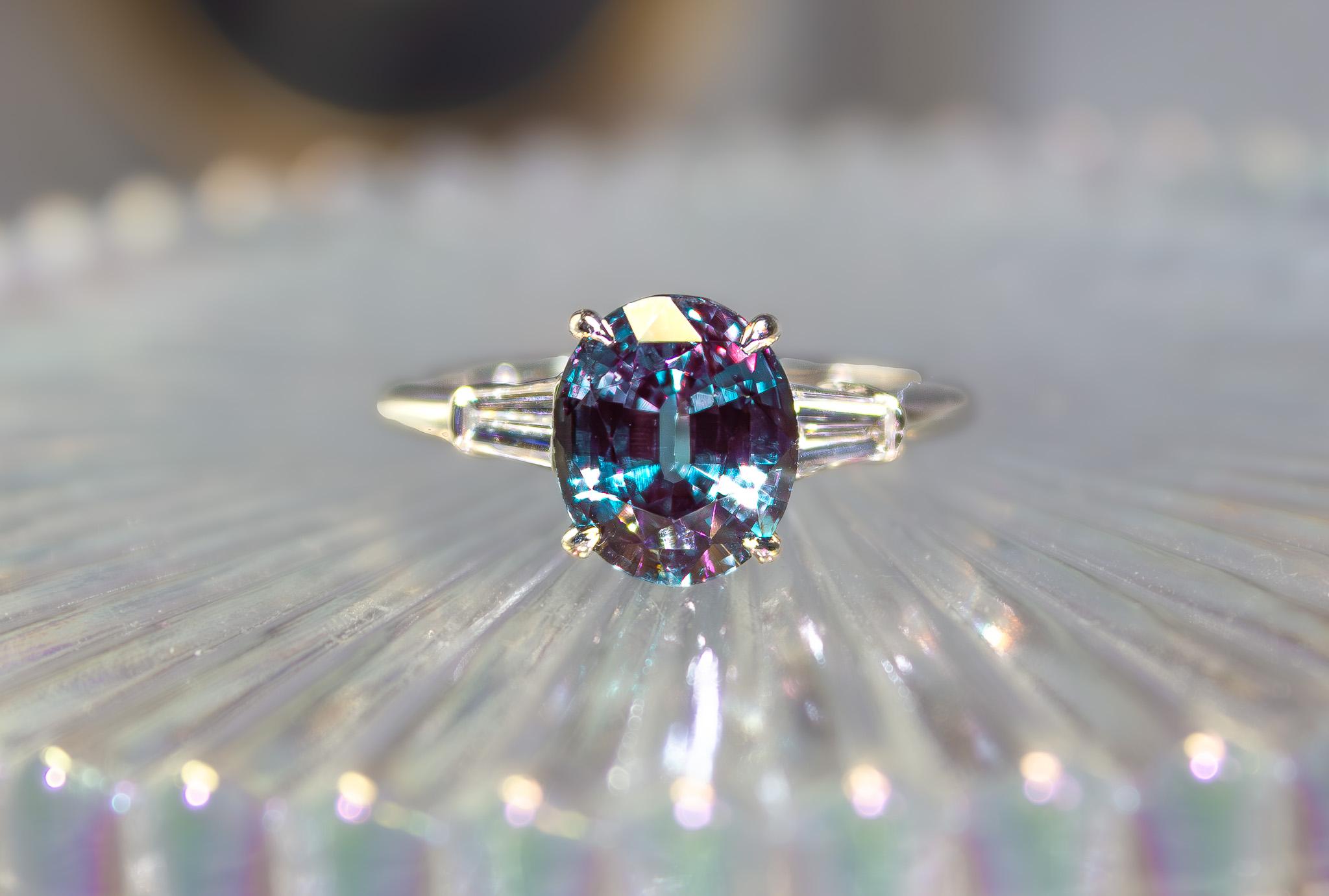 Truly Rare, Highly Collectible
3.07 Carat Alexandrite Set in Platinum with 0.20 Carat Total Weight of Tapered Baguette Cut Diamonds

Signed Tiffany & Co. no. 16431281 PT950 3.07

Superb AGL Certificate
Color Change of Blue - Green to Purplish