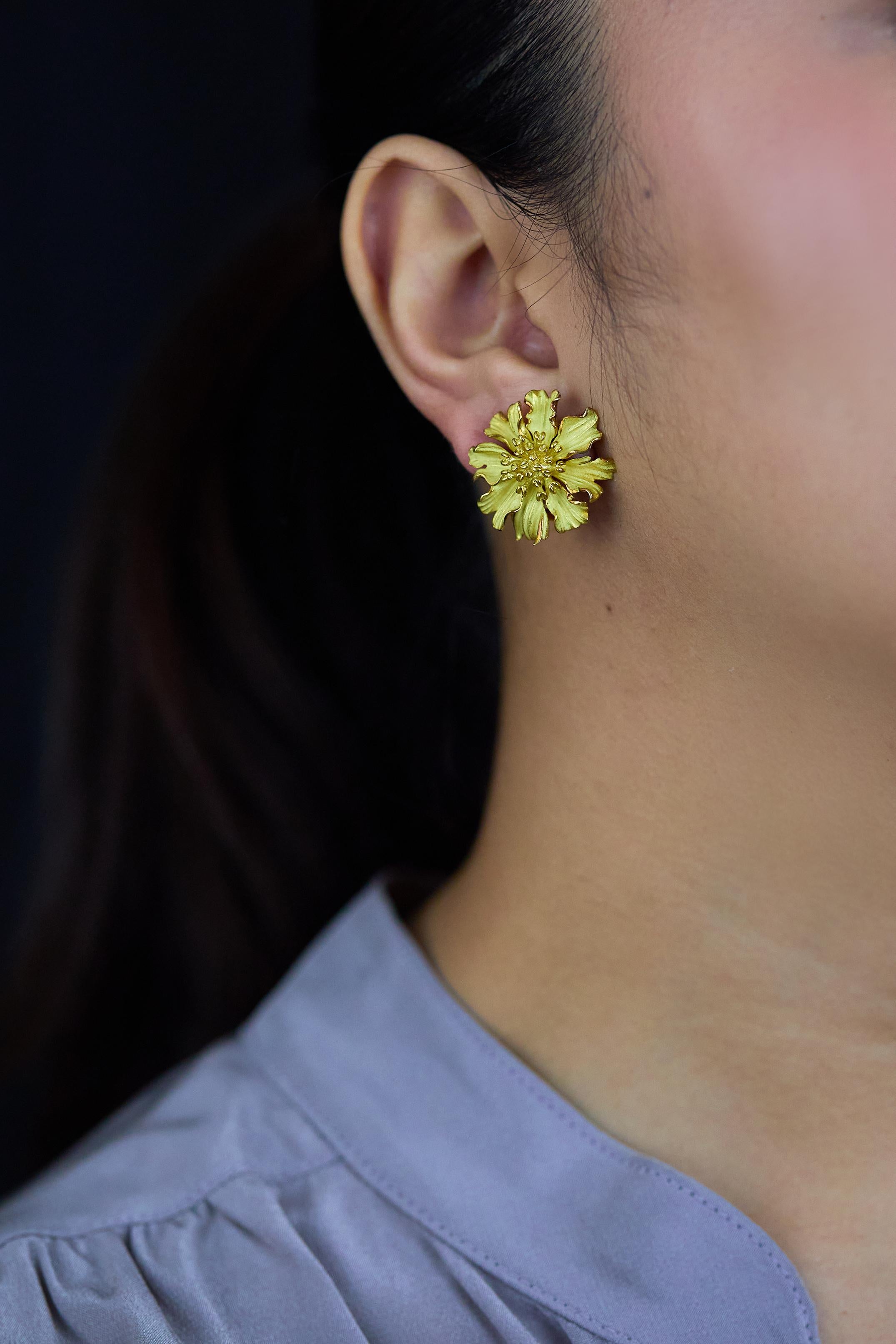 A beautiful pair of earrings created by Tiffany & Co. from the Alpine rose collection. Finely made of 18K yellow gold and weigh 15 grams. Perfect for casual wear. 