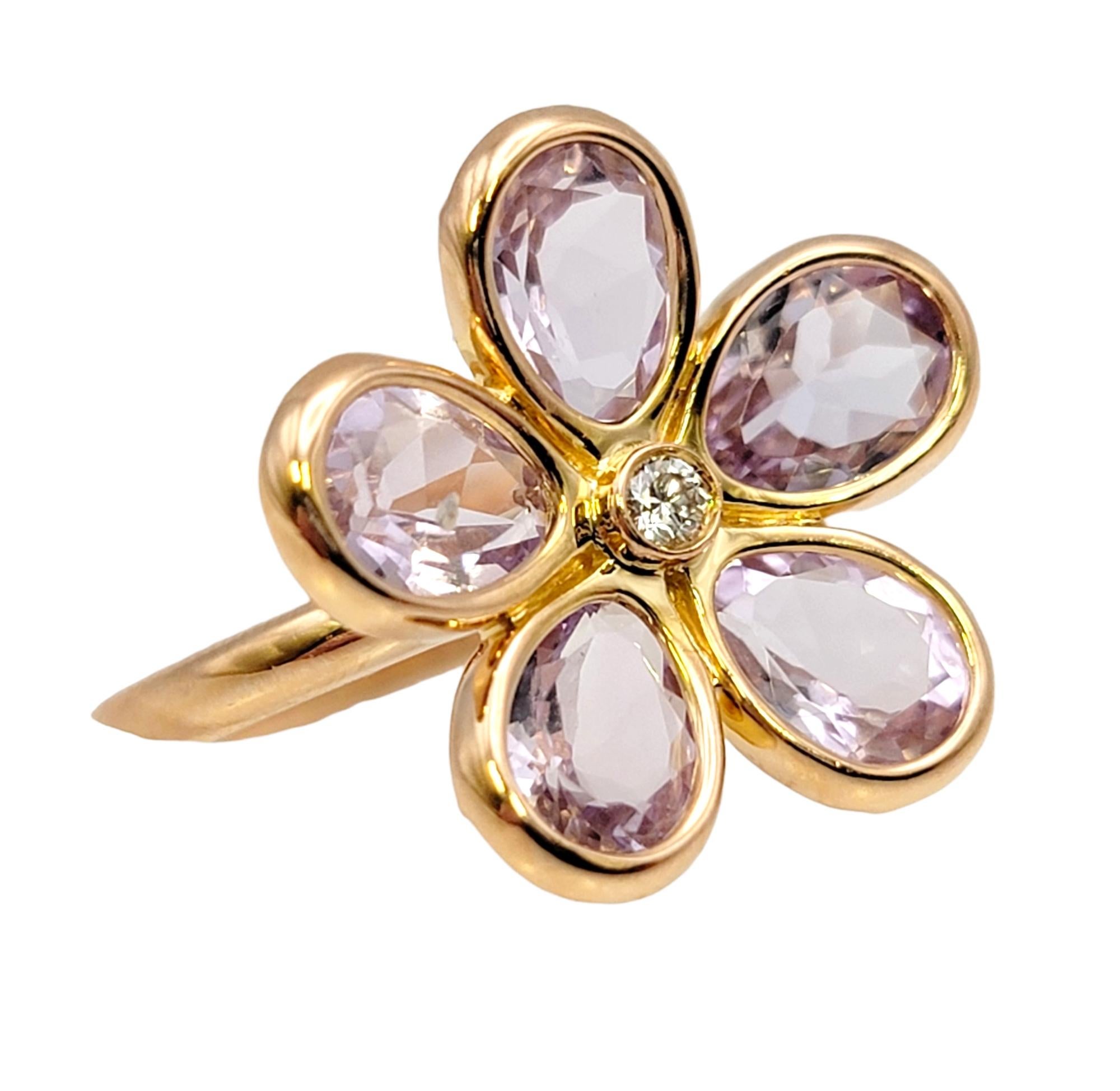 Ring size: 6

This fabulous and feminine flower ring by Tiffany & Co. will absolutely light up your finger! The dreamy light purple stones paired with the warm rose gold setting is absolutely stunning. The single diamond accent adds an extra bit of