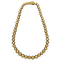 Tiffany & Co. an 18ct Gold Graduated Bead Necklace, circa 1980s