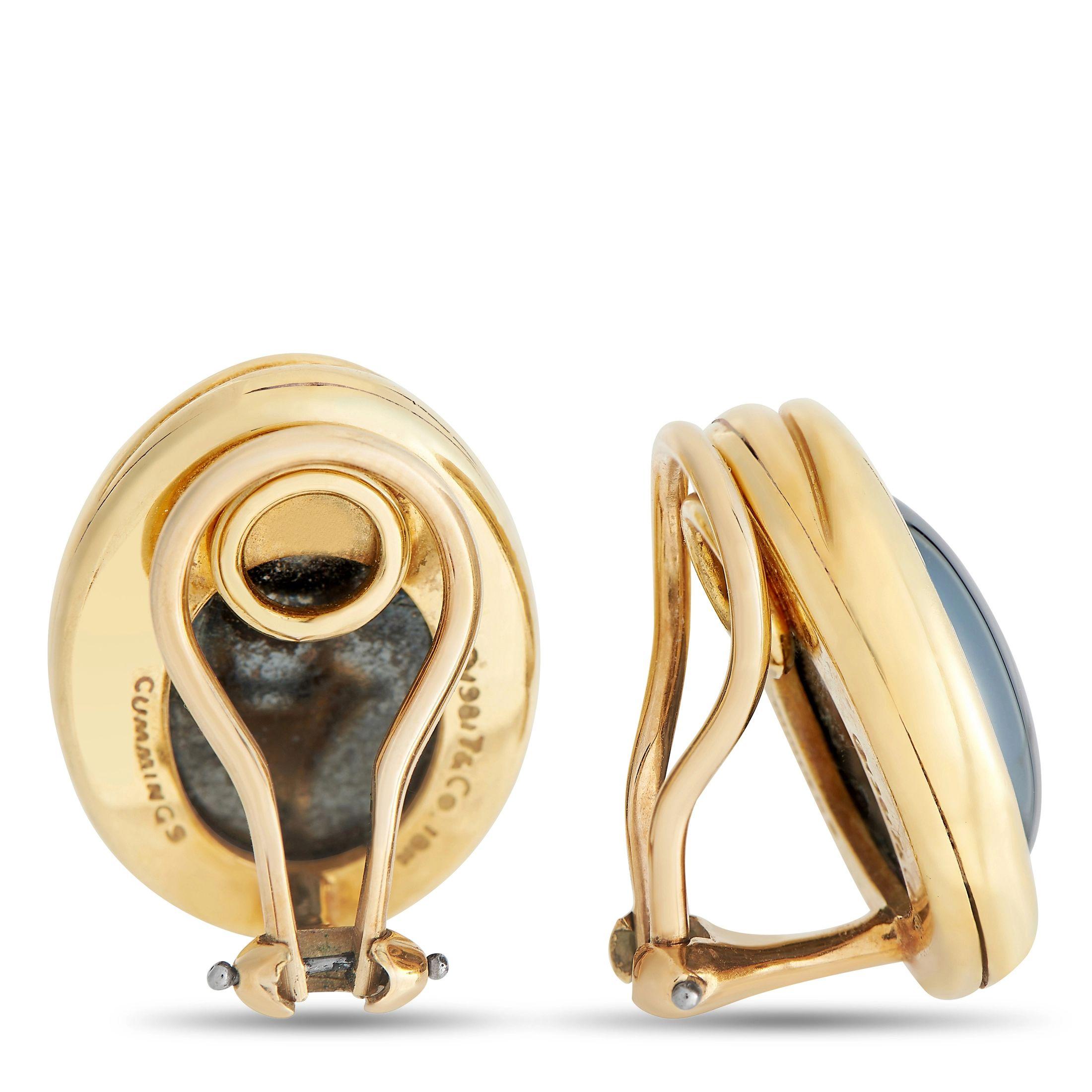 These Tiffany & Co. Angela Cummings have a minimalist aesthetic that will never go out of style. At the center of the oval-shaped 18K Yellow Gold setting, polished Hematite stones serve as a stunning focal point. Each one measures 0.75” long, 0.65”