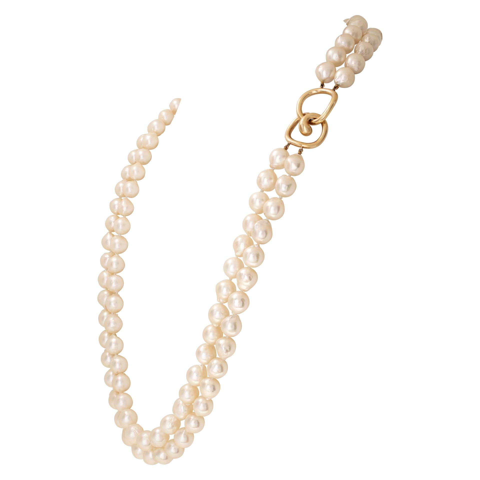 Angela Cummings Tiffany & Co. Opera length (34 inches) double stranded snowflakes Baroque Akoya pearls (8.5 x 9mm) gold to silver overtones necklace with 18K yellow gold clasp. Hallmarks on 18K yellow gold clasp 