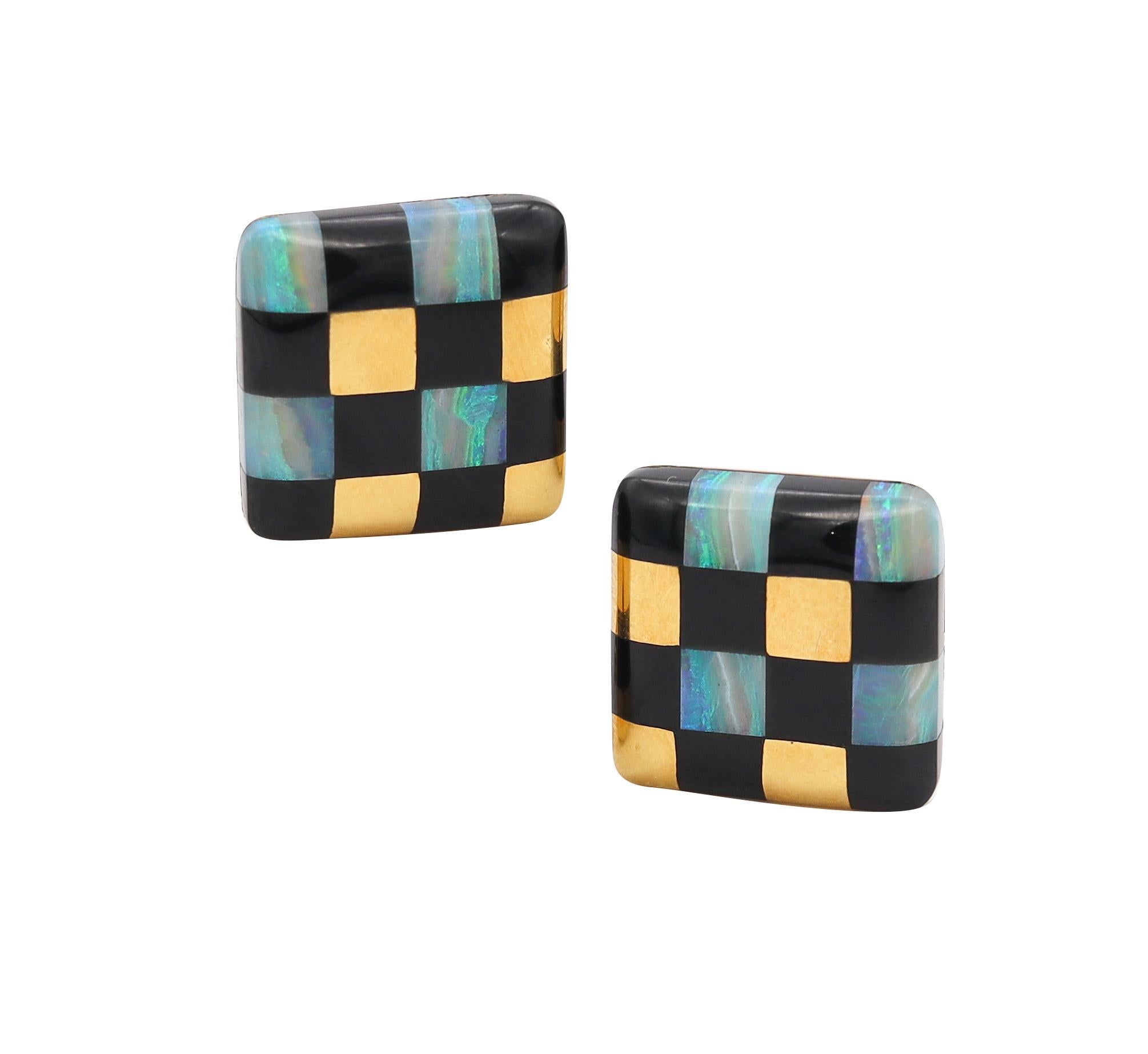 Checkerboard Earrings designed by Angela Cummings for Tiffany & Co.

Beautiful vintage squared geometric pair created by Angela Cummings in New York, back in the early 1980's. This pair of earrings was carefully crafted in solid yellow gold of 18