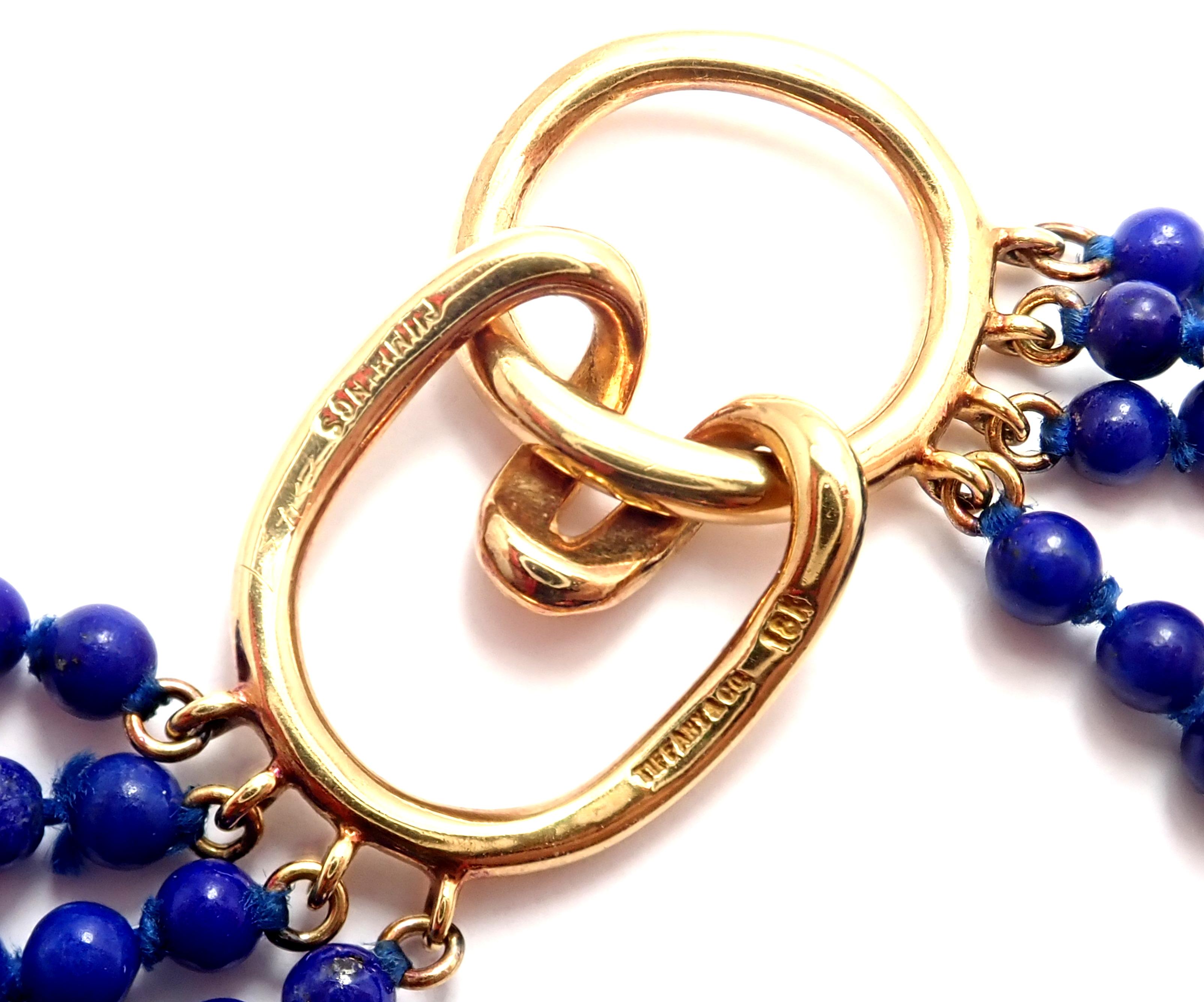 18k yellow gold Lapis Lazuli Choker Necklace by Angela Cummings for Tiffany & Co.
With Lapis Lazuli beads.
Metal: 18k yellow gold
Length: 13 inches
Weight: 26.3 grams
Width: 15mm
Hallmarks: Tiffany & Co Cummings 18k
YOUR PRICE: $2,900
T2466mtdd