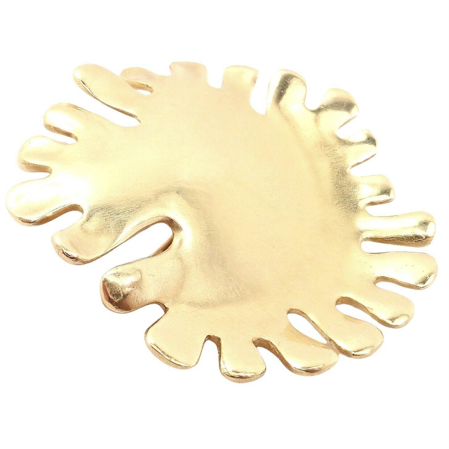 18k Yellow Gold Nickelodeon Abstract Brooch by Angela Cummings for Tiffany & Co. 
Details: 
Measurements: 38mm x 38mm
Weight: 15.2 grams
Stamped Hallmarks: T&Co 18k 1981
YOUR PRICE: $3,250
Ti834mloe