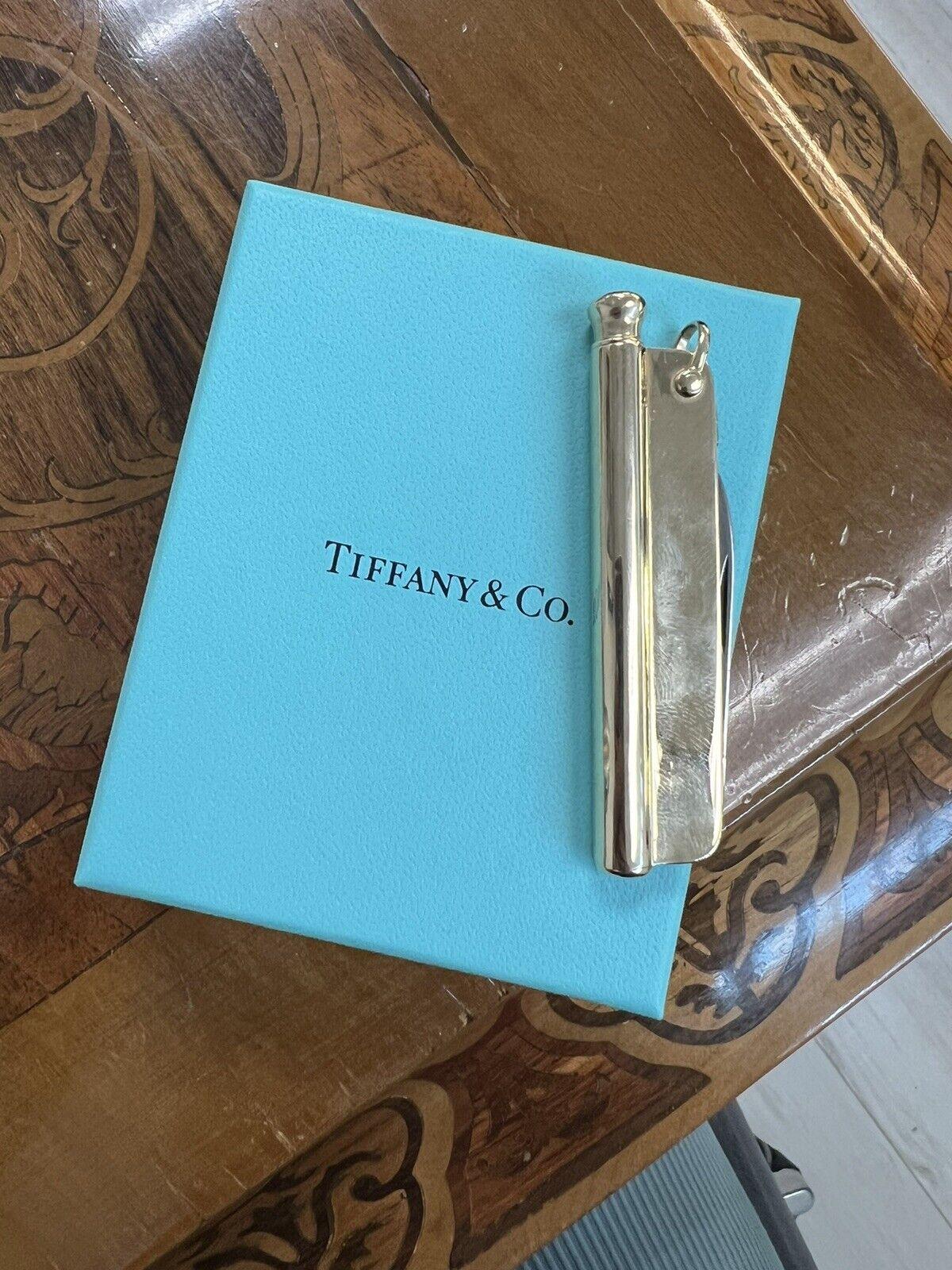 Tiffany & Co. Antique 14k Yellow Gold Pocket Knife / Pencil Pendant Circa 1900s w/Box & Pouch

Here is your chance to purchase a beautiful and highly collectible designer pendant.  Truly a great piece at a great price! 

Weight: 31.9