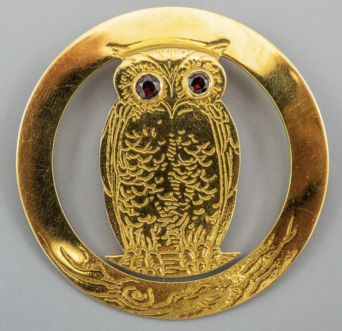 Antique Circa 1900s Tiffany & Co. 18k Yellow Gold & Garnet Owl Pendant

Here is your chance to purchase a beautiful and highly collectible designer pendant.  Truly a great piece at a great price! 

Marked:  Tiffany & Co Makers 17373 18K