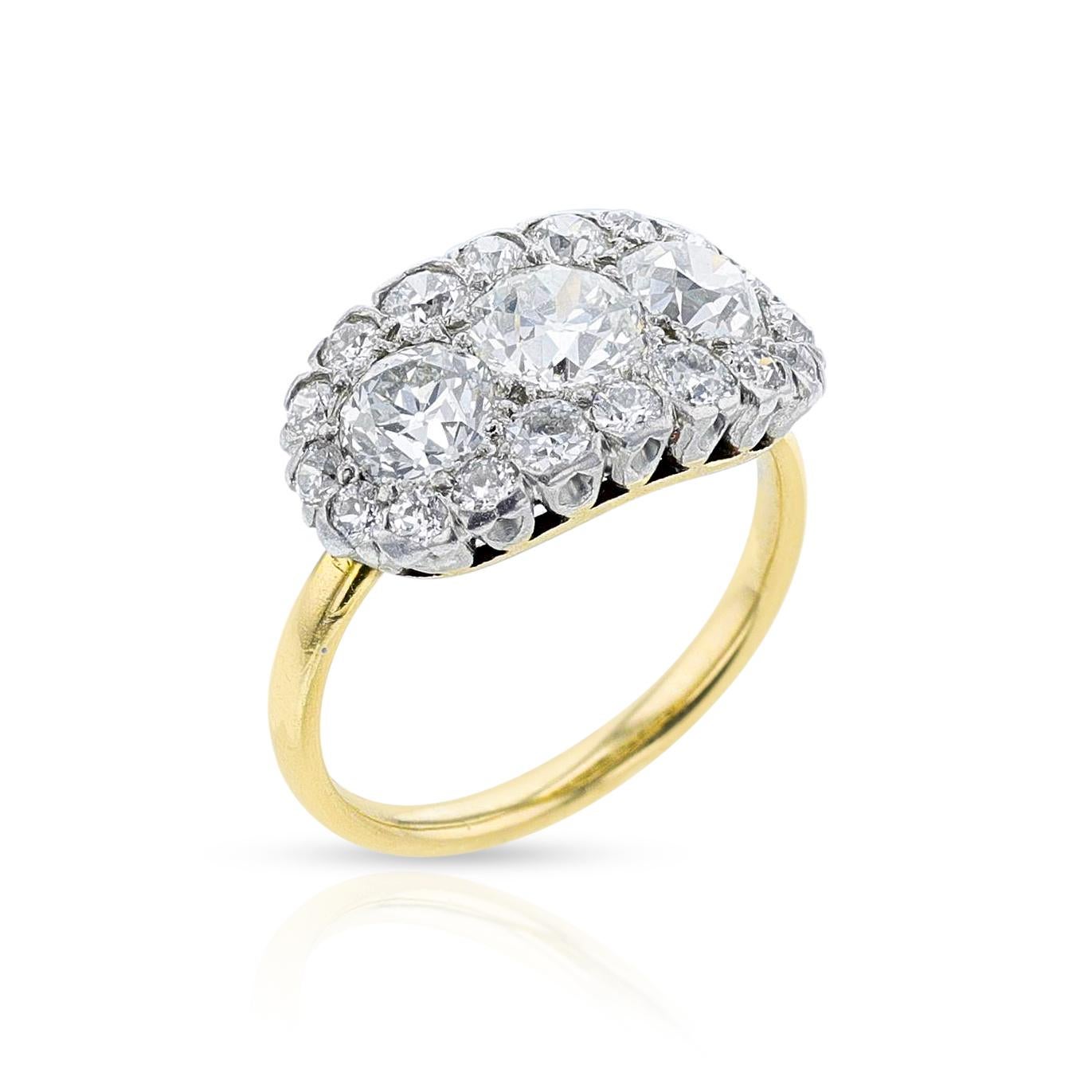 A Tiffany & Co. Antique Diamond Ring made in Platinum & 18k Yellow Gold. The diamonds are European-cut and the total is appx. 2.05 carats. The total weight of the ring is 4.60 grams. The ring size is 5.75 US. The center diamond is appx. 0.63 carats.