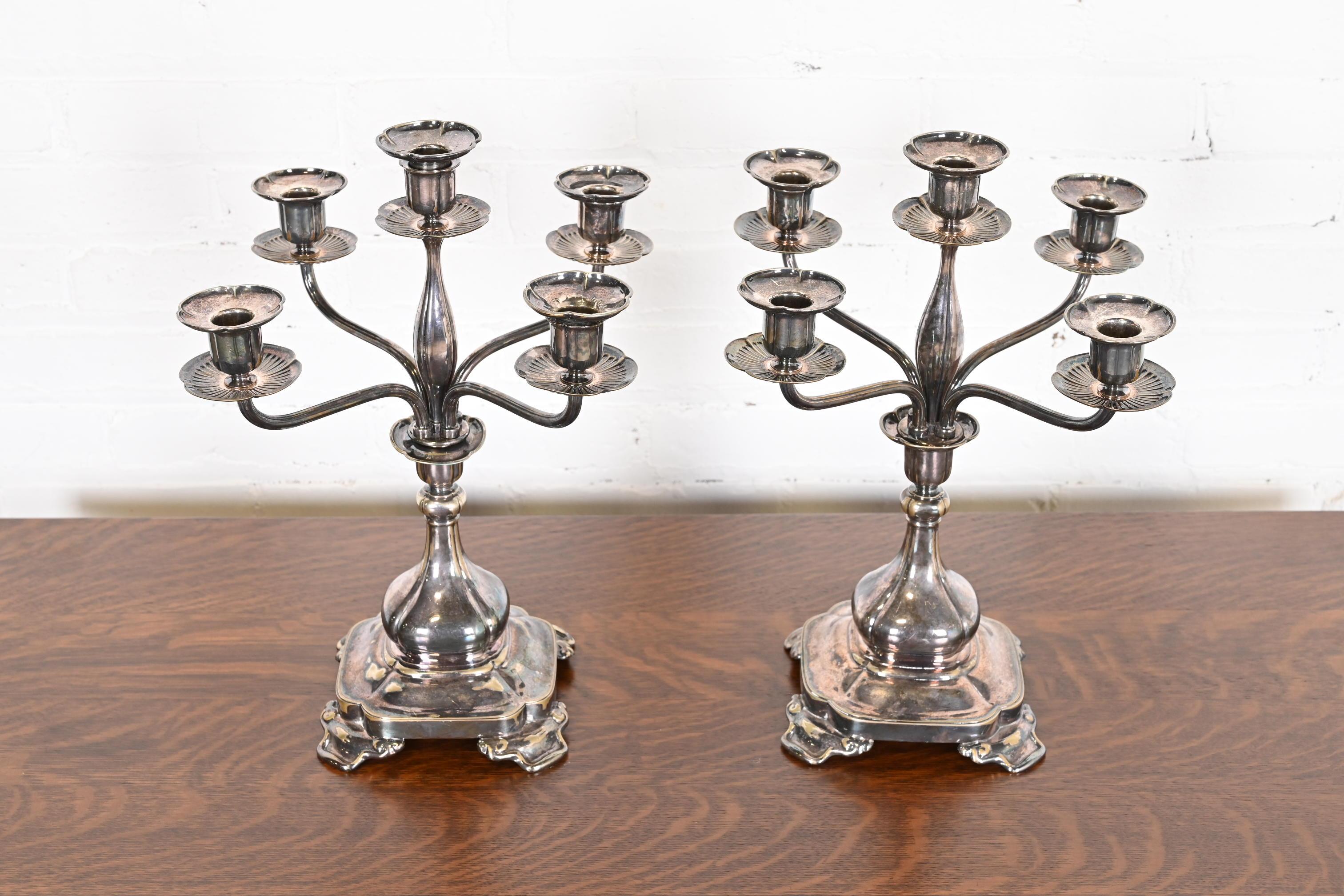 A gorgeous pair of antique silver plate five-light candelabra

By Tiffany & Co. (signed at the base)

USA, Circa Late 19th Century

Each measures: 14