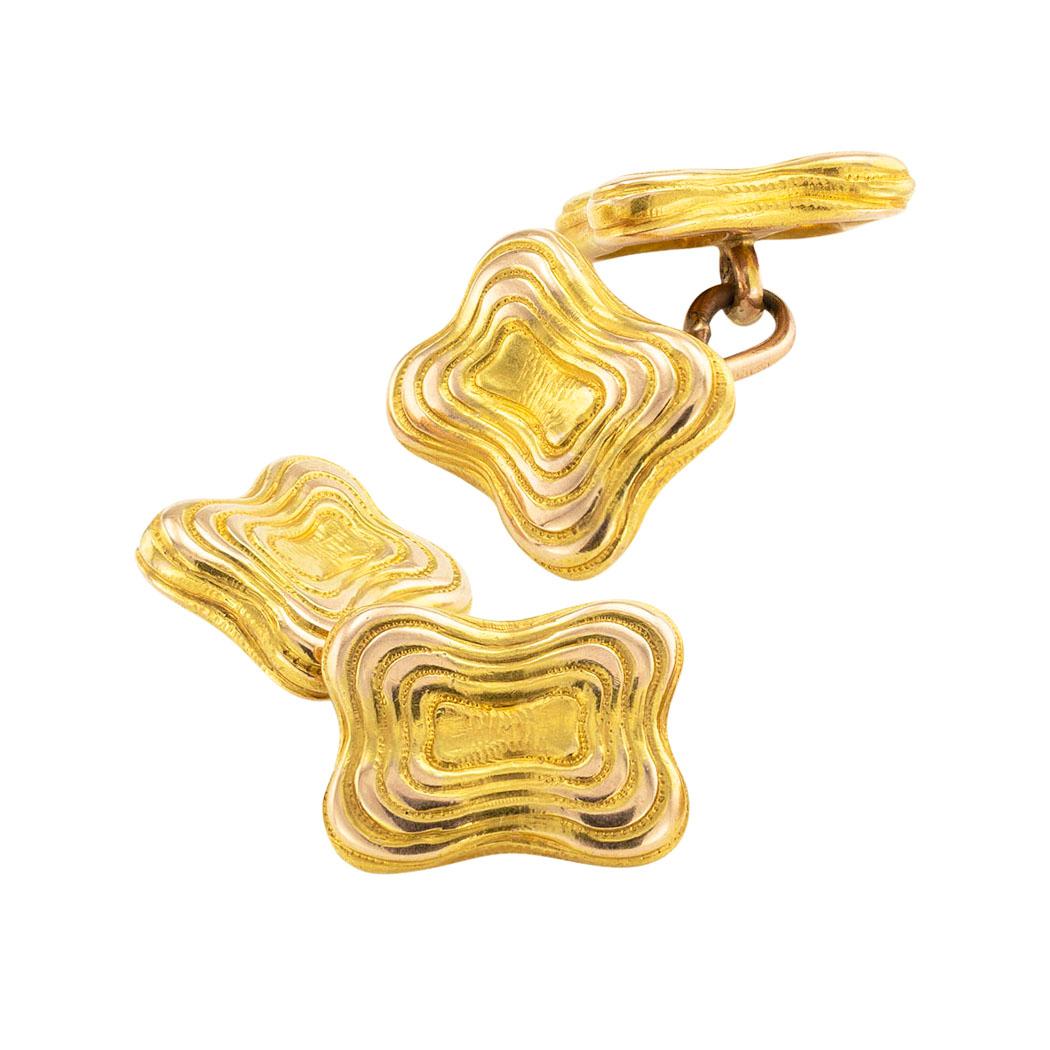 Tiffany & Co double face and gold cufflinks circa 1890. *

ABOUT THIS ITEM: #C-DJ314G. Scroll down for detailed specifications. The designs comprise modified, abstract rectangles featuring concentric grooves that repeat the outline of the faces.