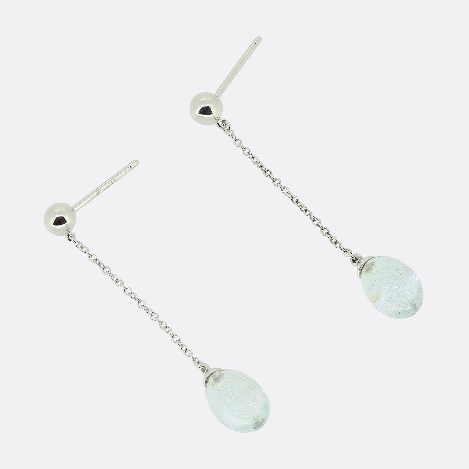 Here we have chic and stylish pair of drop earrings from the world renowned jewellery designer, Tiffany & Co. Each piece has been crafted from 18ct white gold with a plain polished ball motif playing host to a slim belcher chain which suspends a