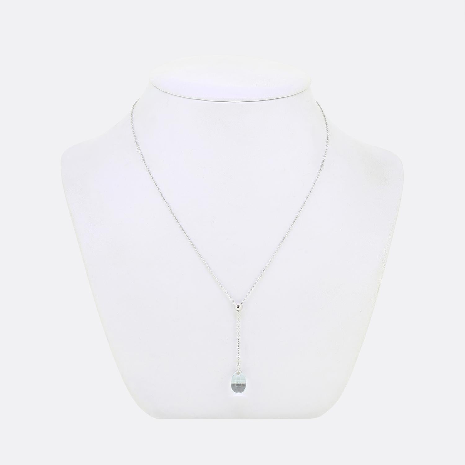 Here we have fabulous necklace from the world renowned jewellery designer, Tiffany & Co. This pendant has been crafted from 18ct white gold with a plain polished ball motif atop playing host to a slim belcher chain which suspends a freely hanging